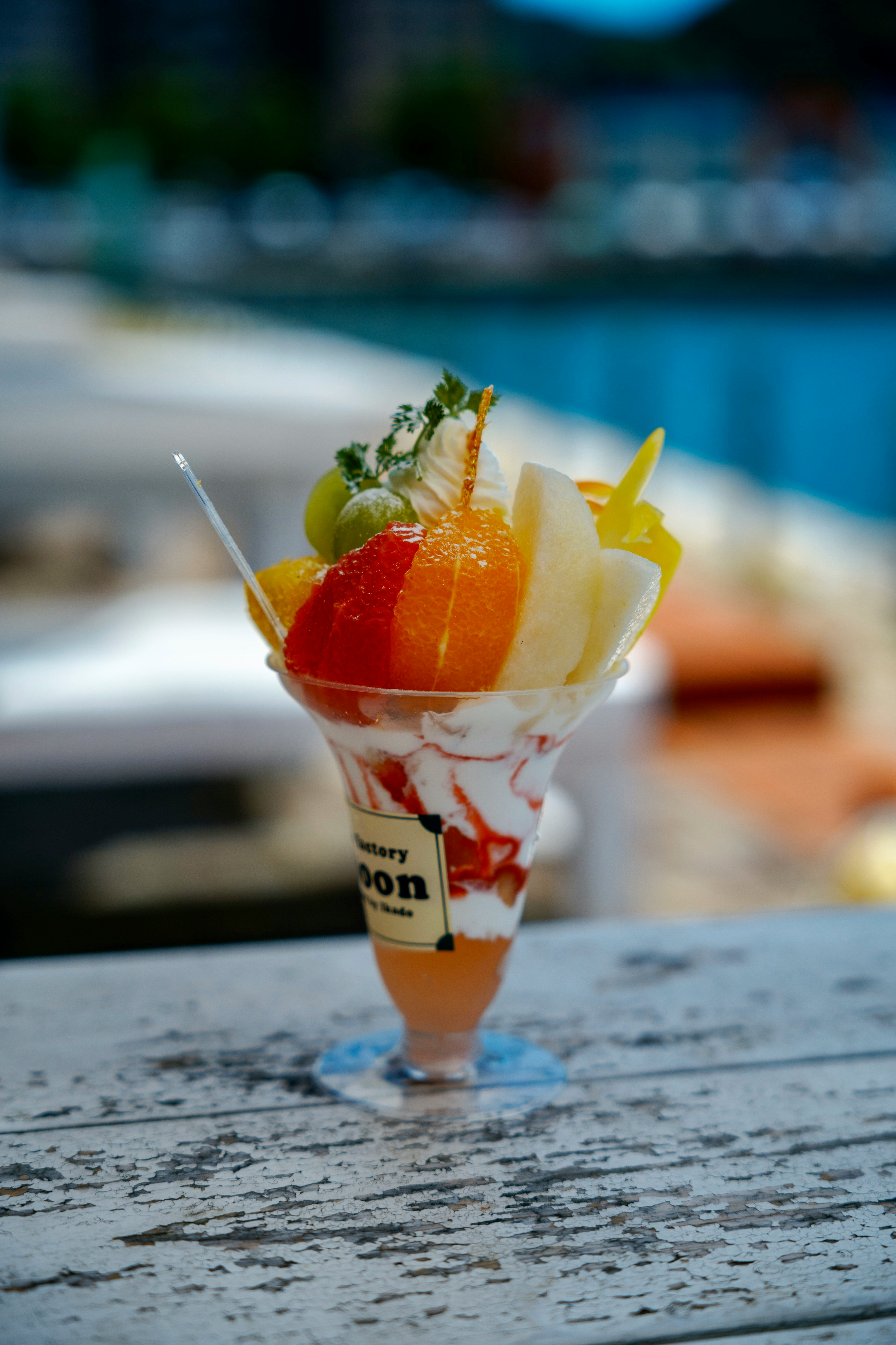 Fruit parfait on a seaside table