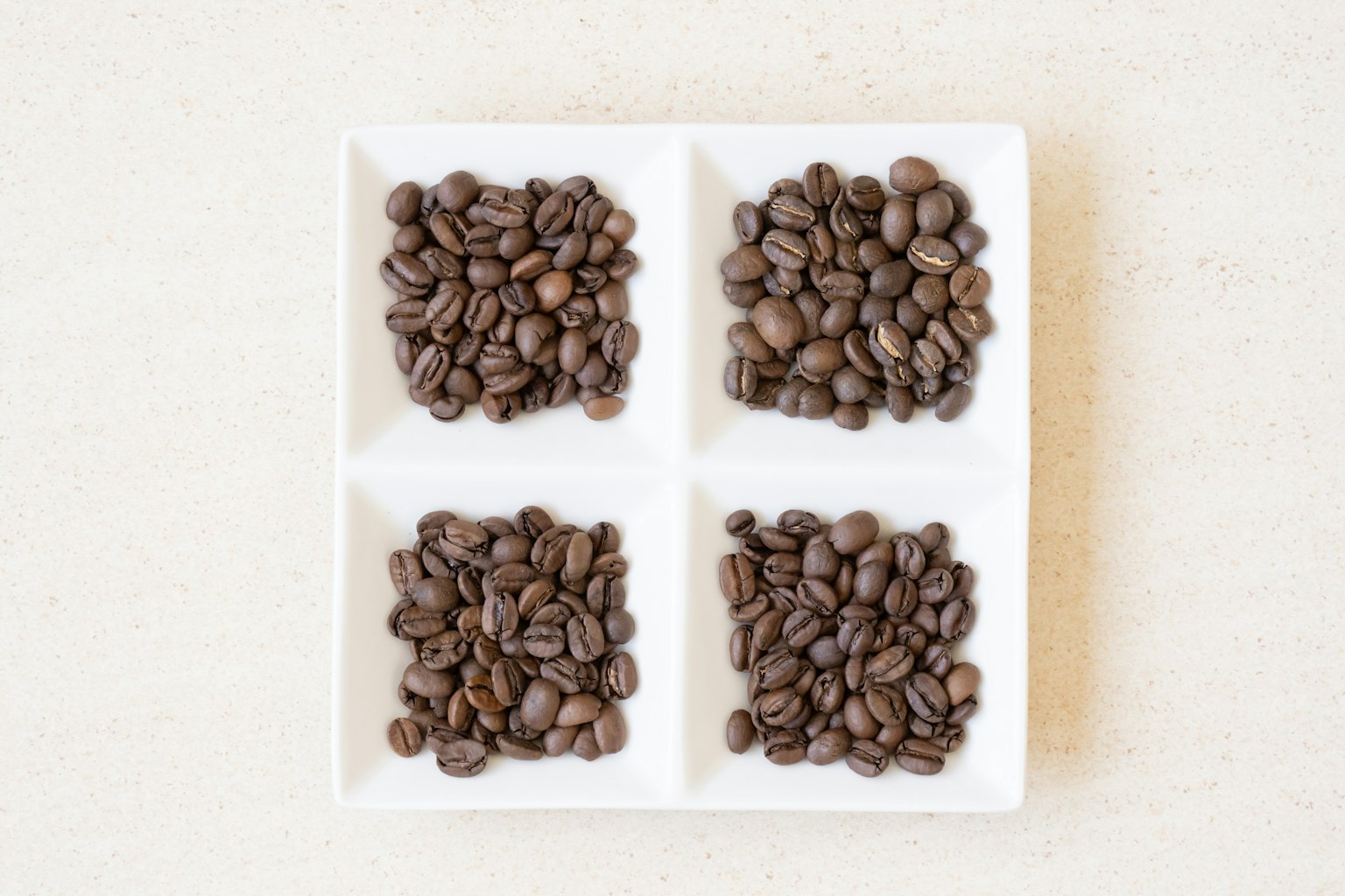การจัดเรียงเมล็ดกาแฟในสี่ส่วน