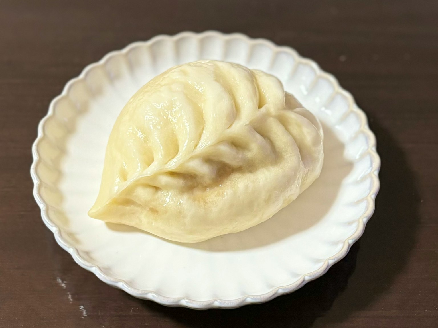 Leaf-shaped bun on a white plate