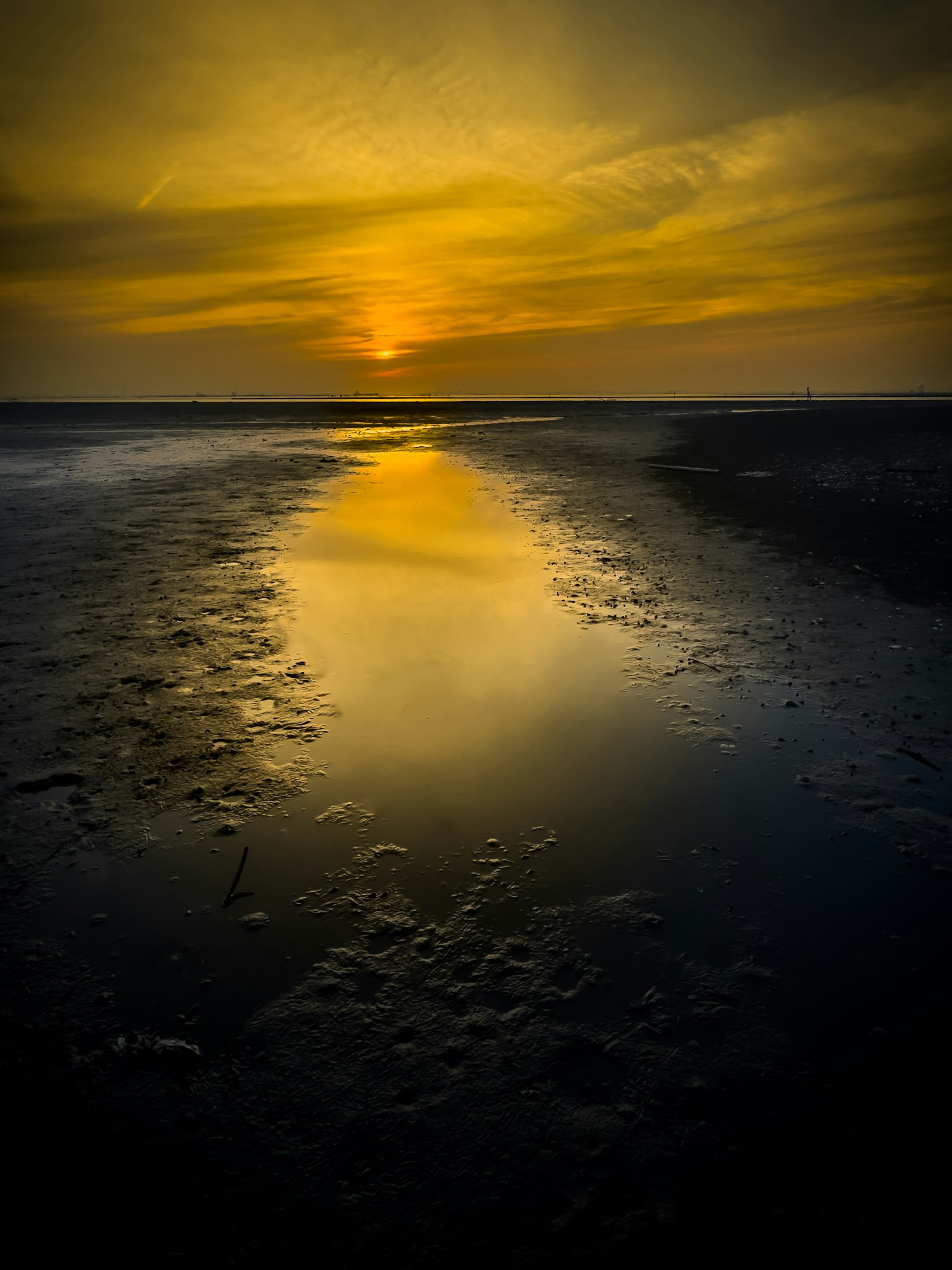 Scenic beach view with a beautiful sunset reflection