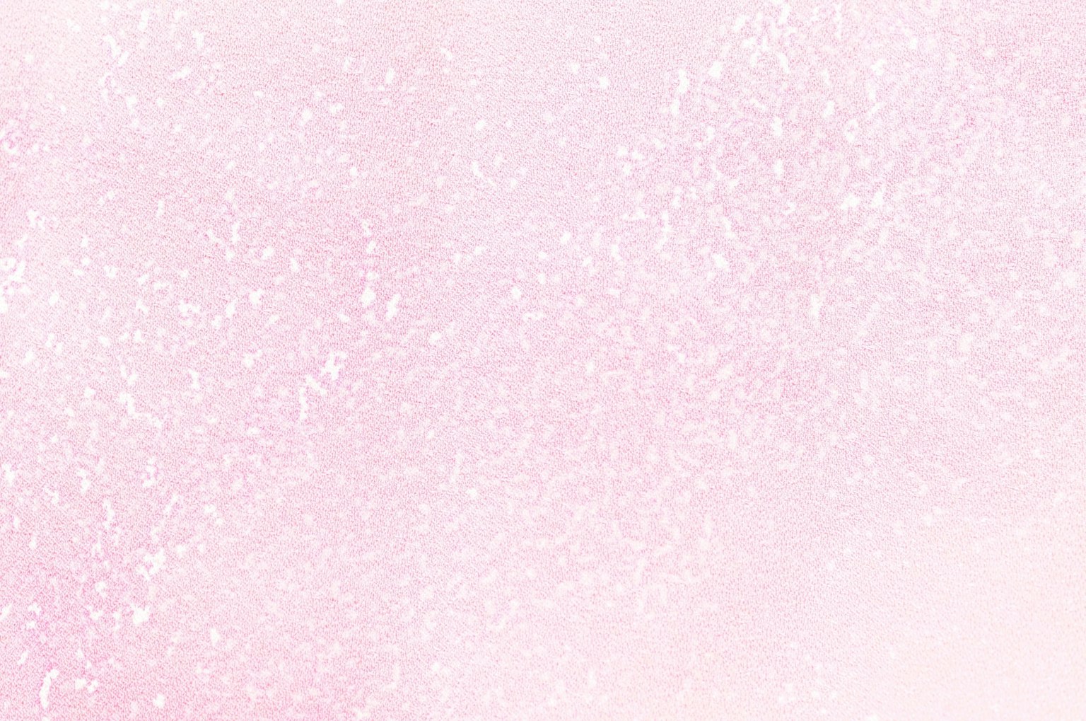 Fond rose doux avec des paillettes subtiles éparpillées