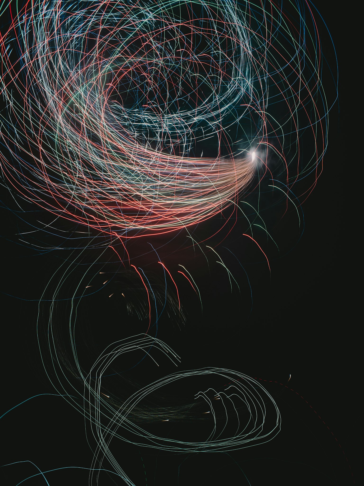 Abstract design featuring swirling colorful light trails