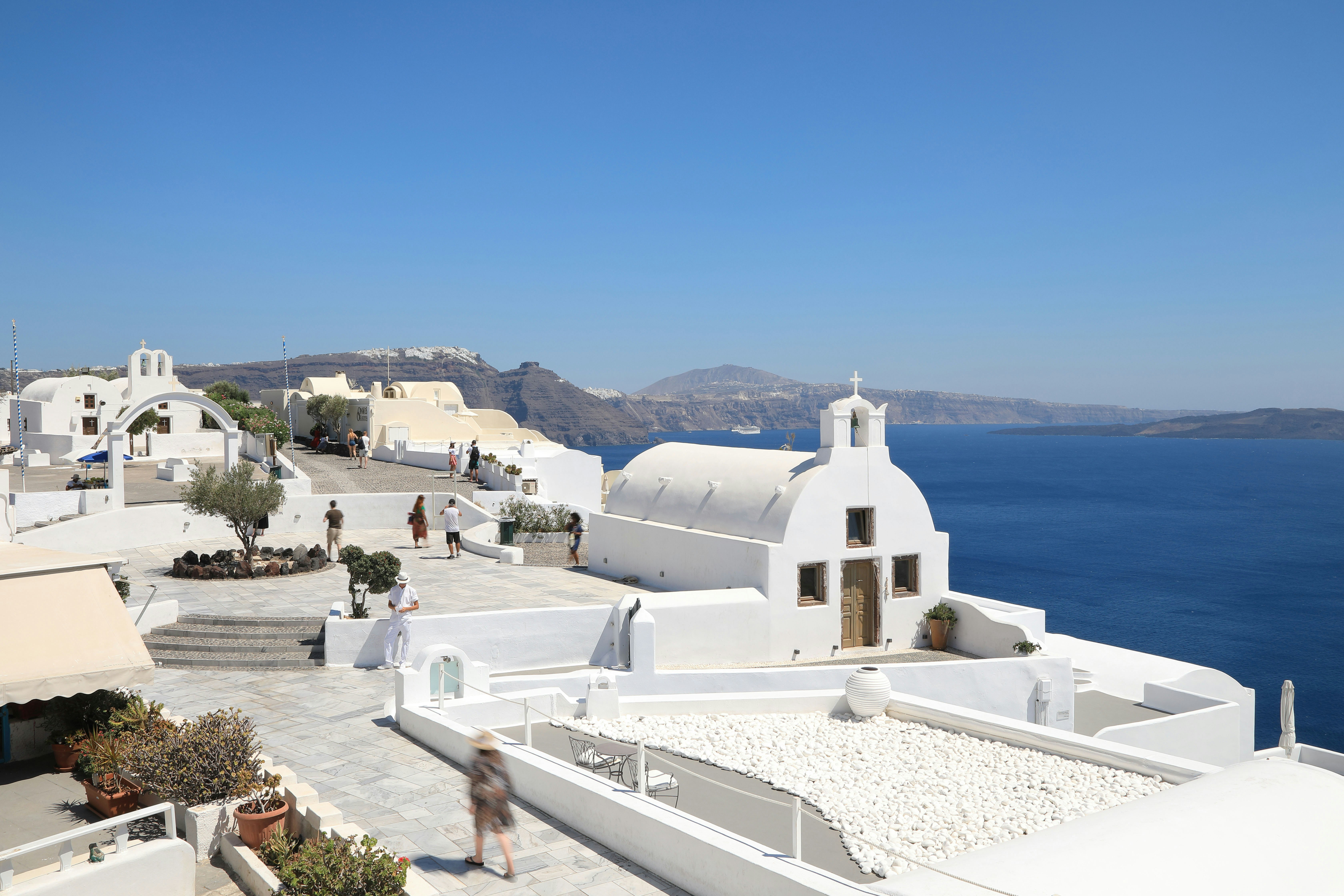 Santorini island seaside view with white-and-blue buildings