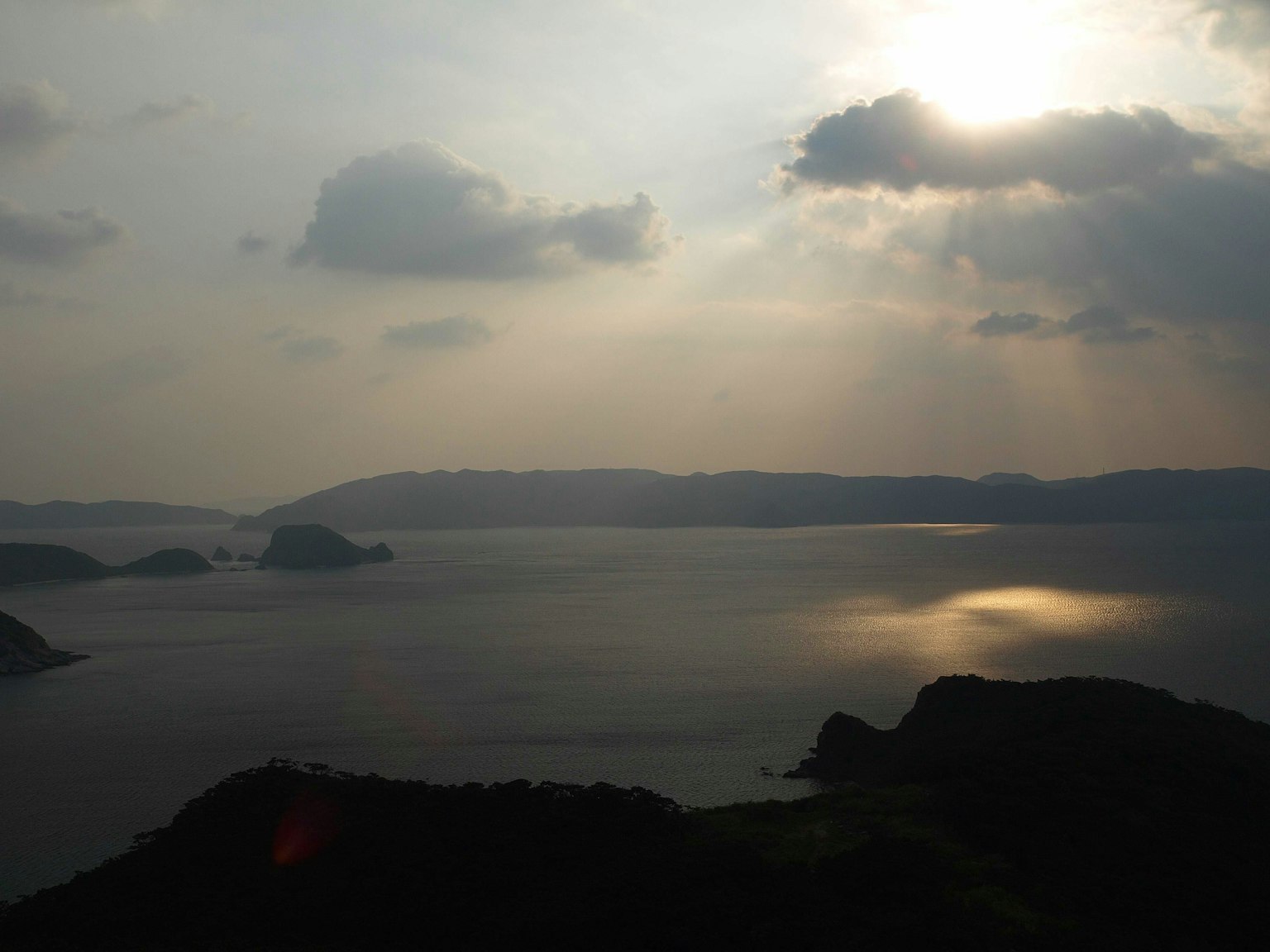 Serene seascape with sunrise backdrop