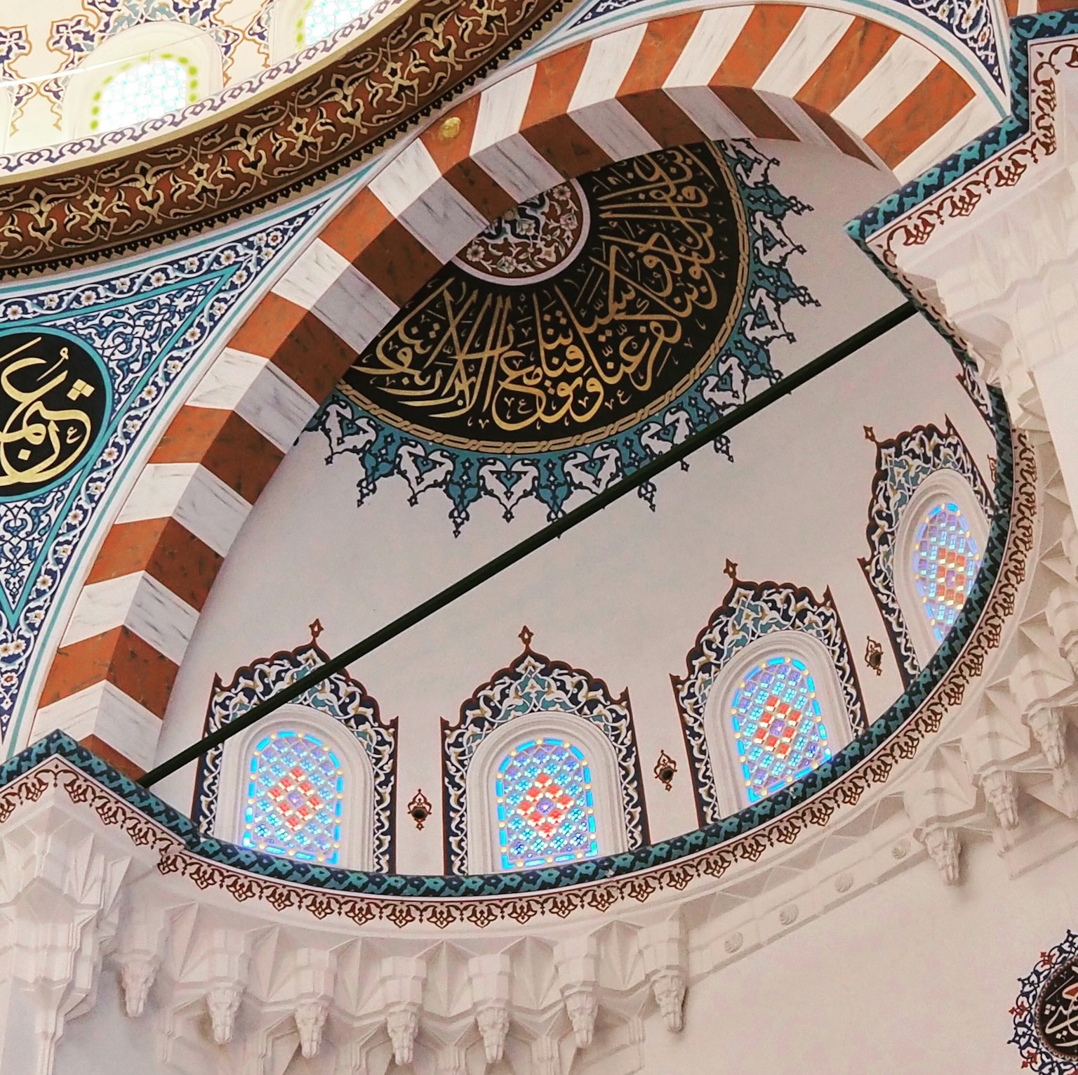 Interior of a beautiful mosque featuring arch design and decorative tiles