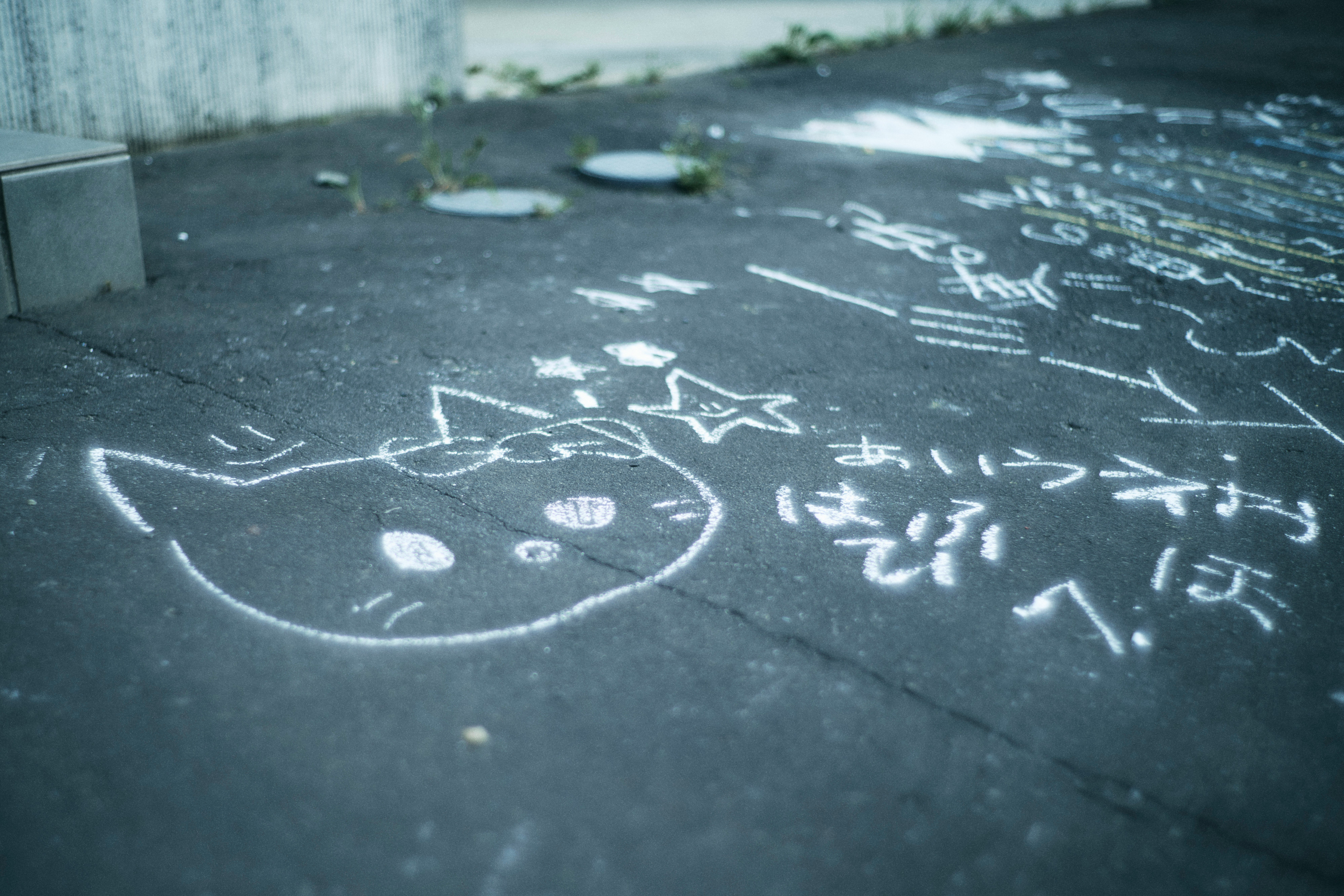 concrete pavement with chalk graffiti