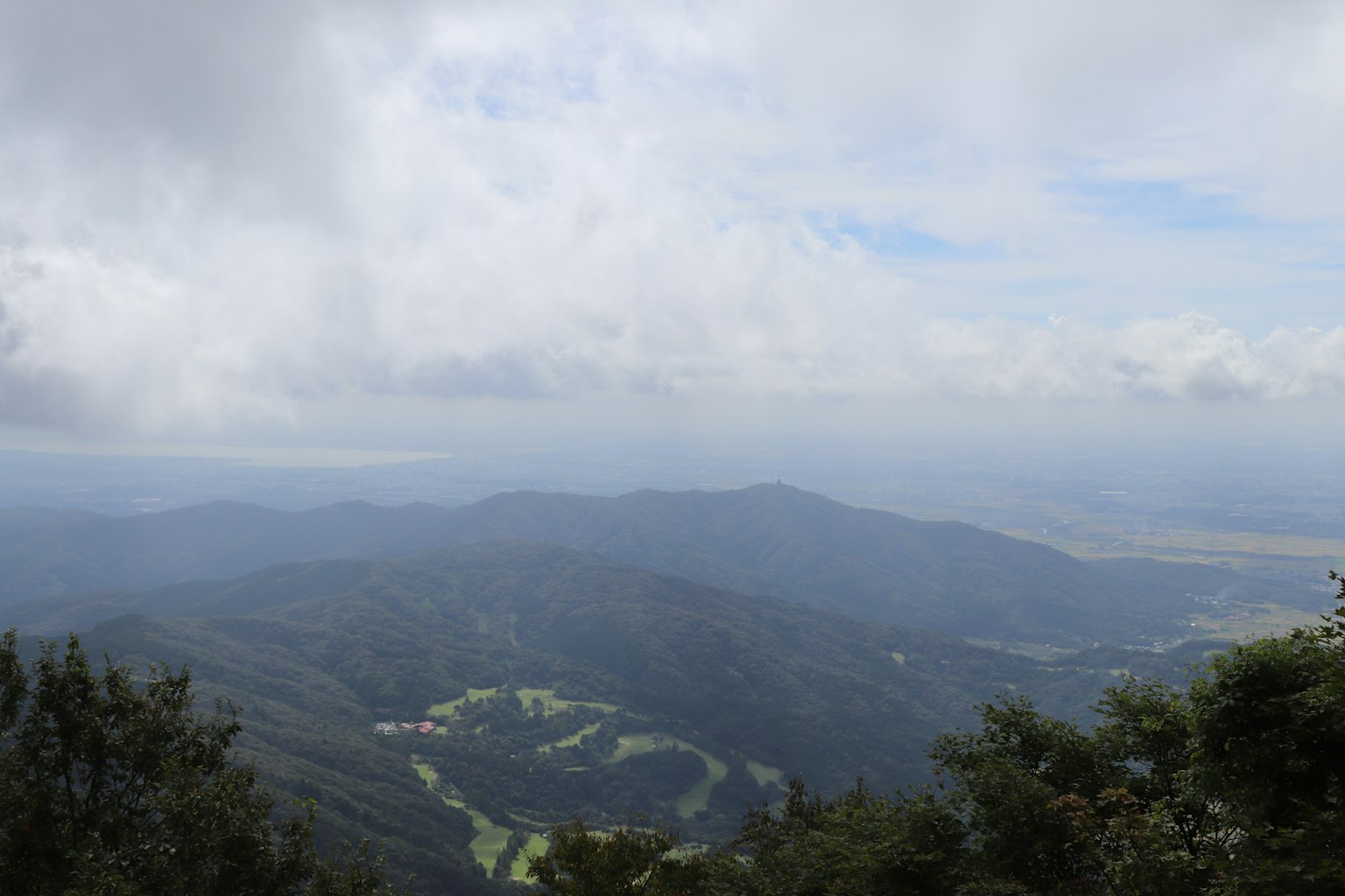 Mountain landscape with expansive clouds
