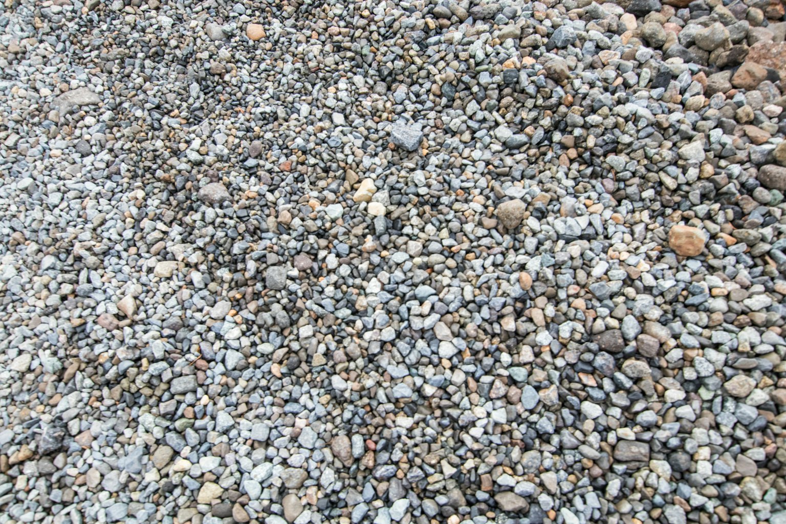 Surface of gravel composed of various colored small stones