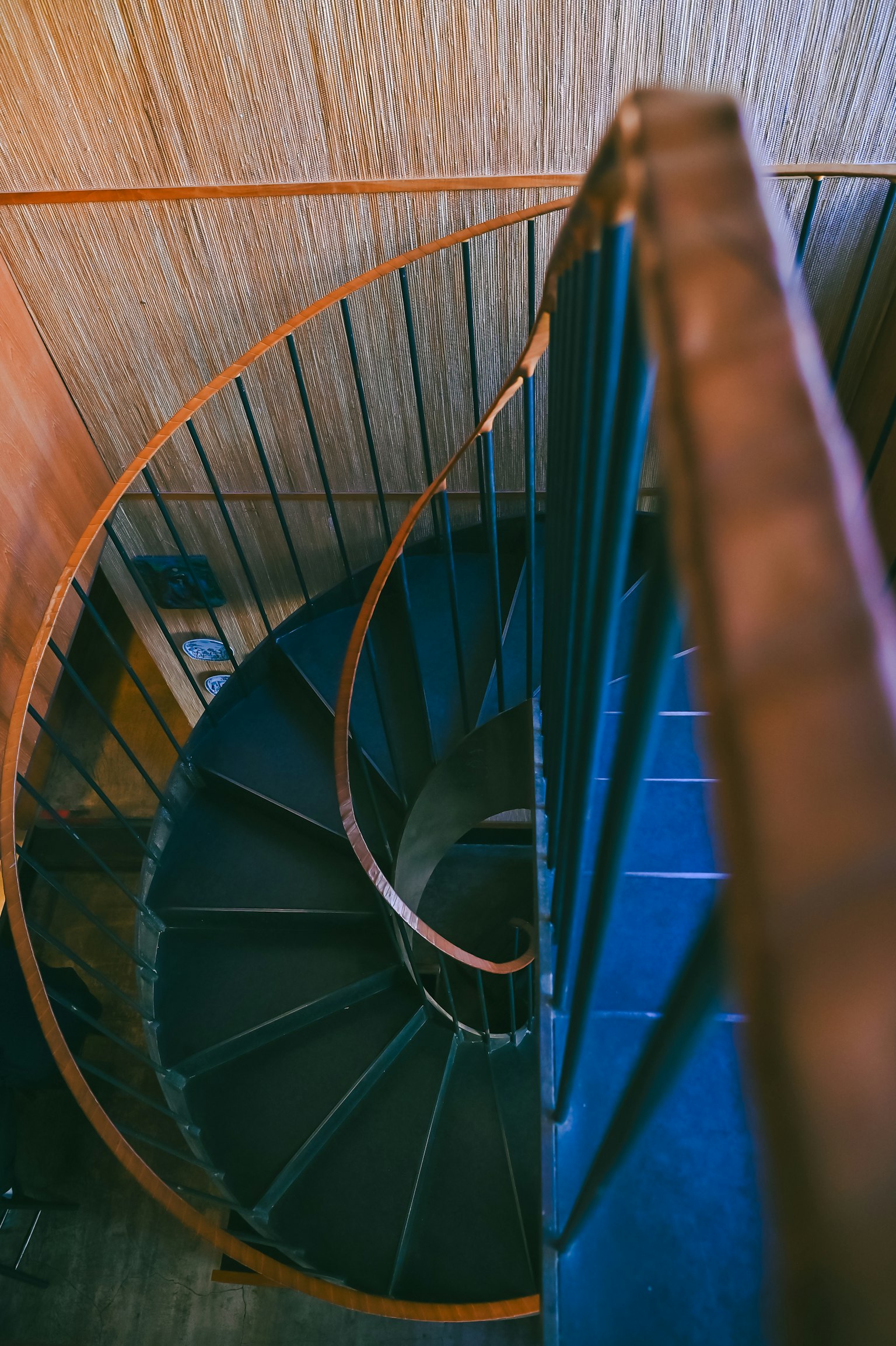 Aerial view of a spiral staircase showcasing elegant design and colors