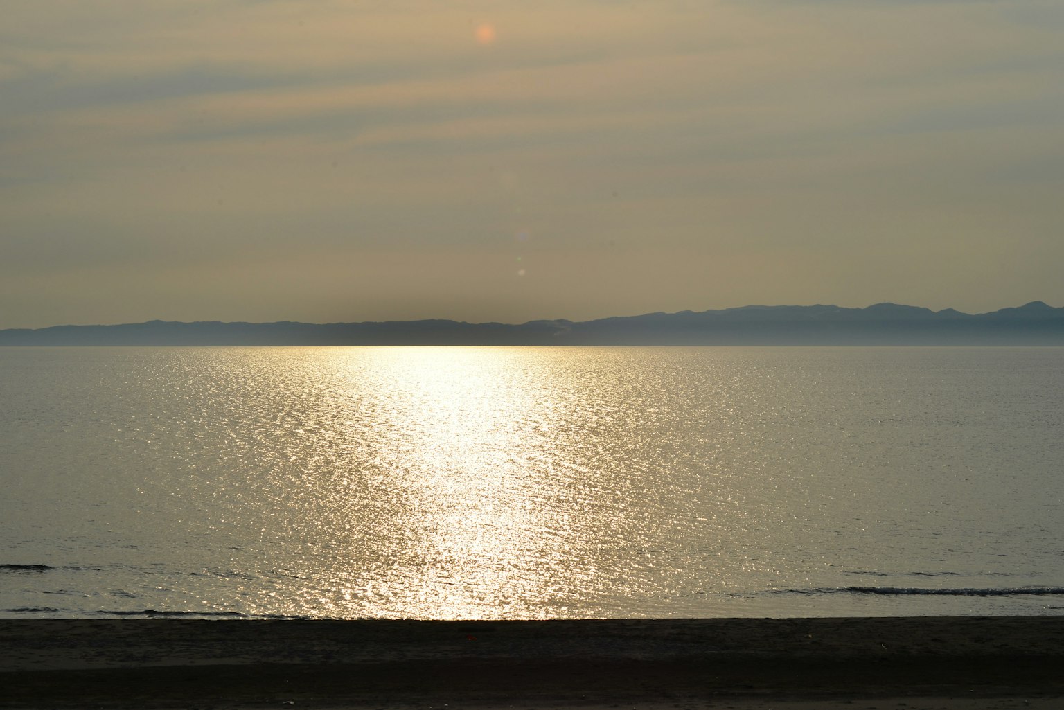 Calm sea view with a soft reflection of the sky