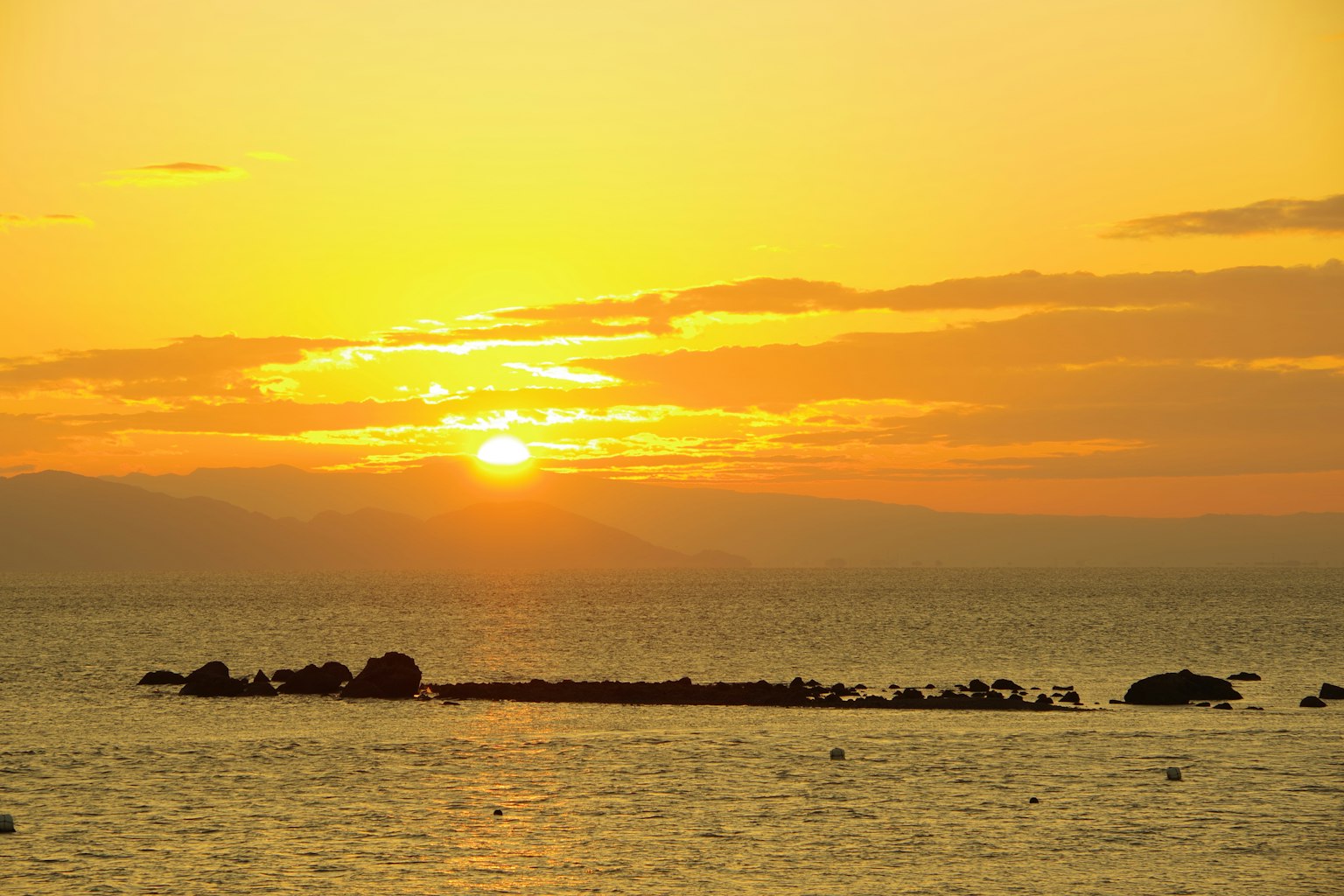 Beautiful sunset over the sea with an orange sky