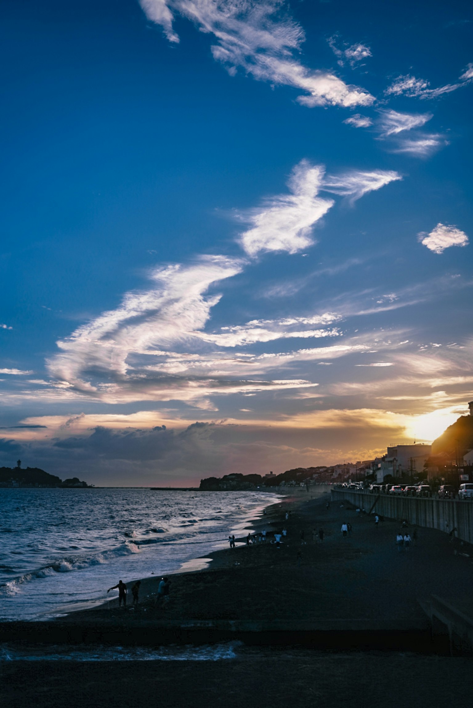 Beautiful seaside landscape at sunset with blue sky and white clouds