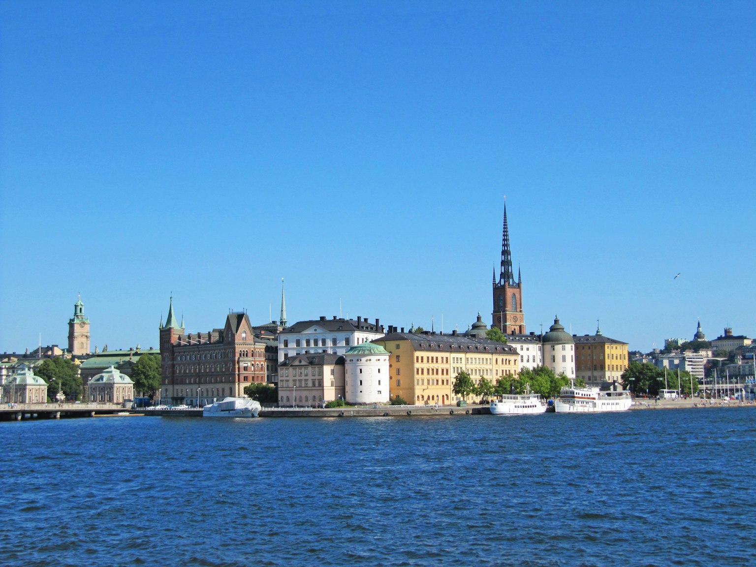 Beautiful view of Stockholm with blue sky and waterfront buildings