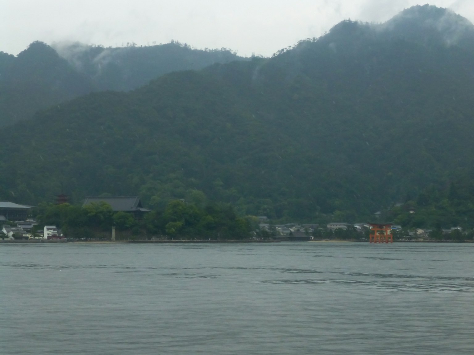 Calm lake scenery surrounded by mountains