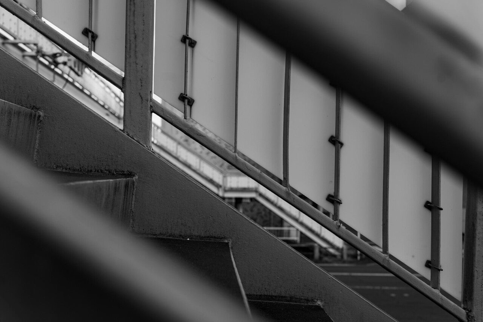 Black and white photo of stairs emphasizing angles and structure