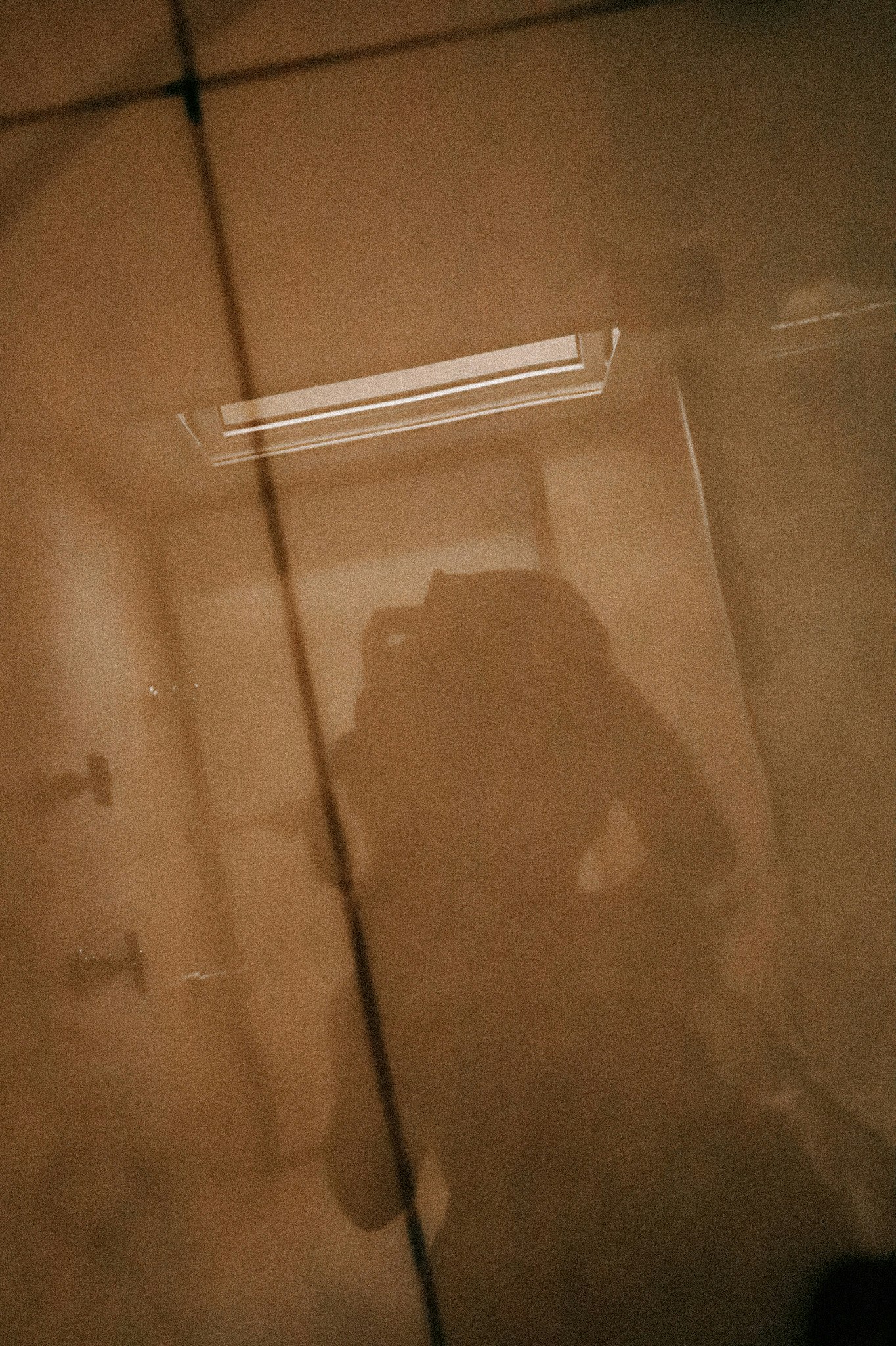 Indoor small items with shadows reflected through a transparent plastic bag