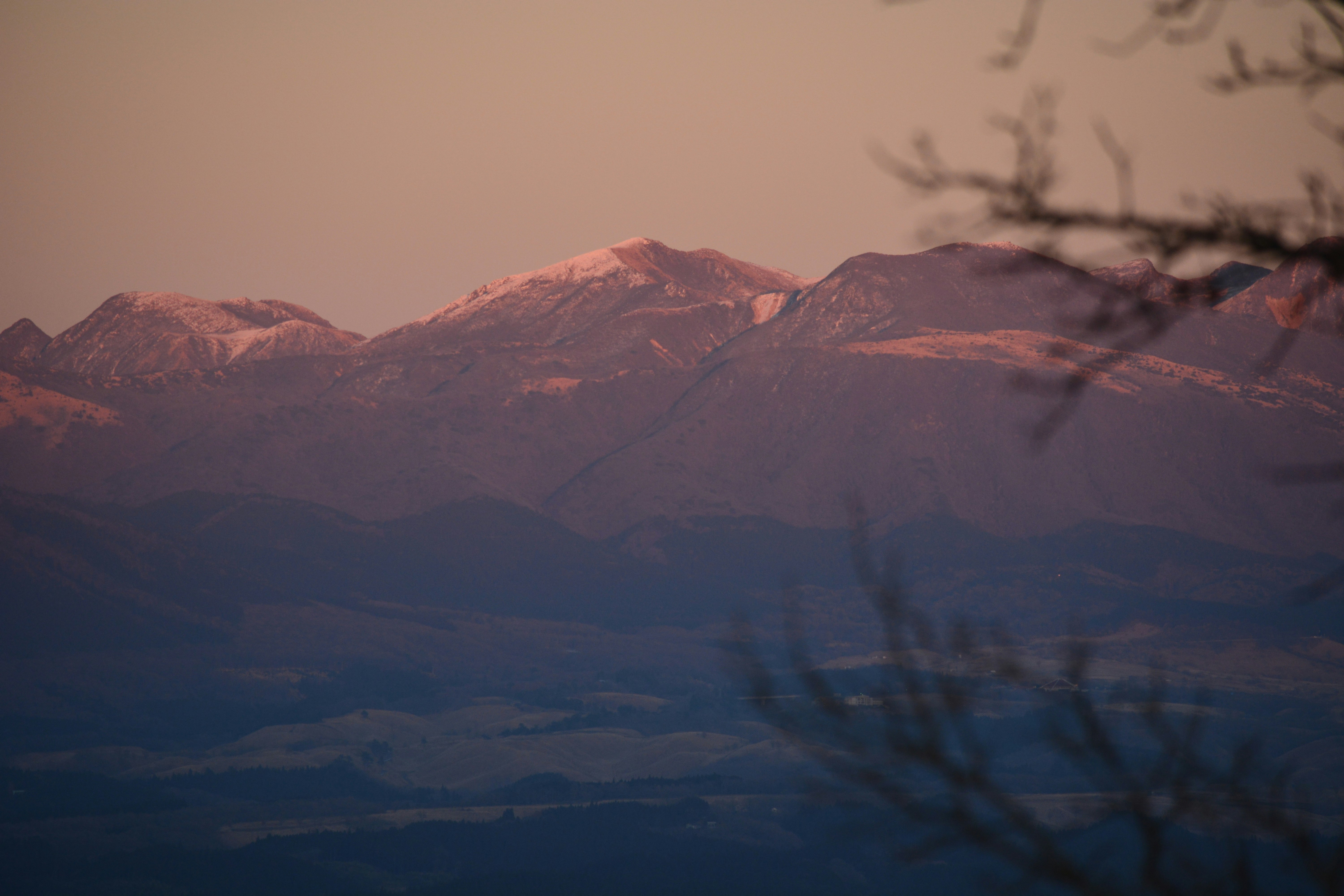 winter mountain ridgeline at dusk