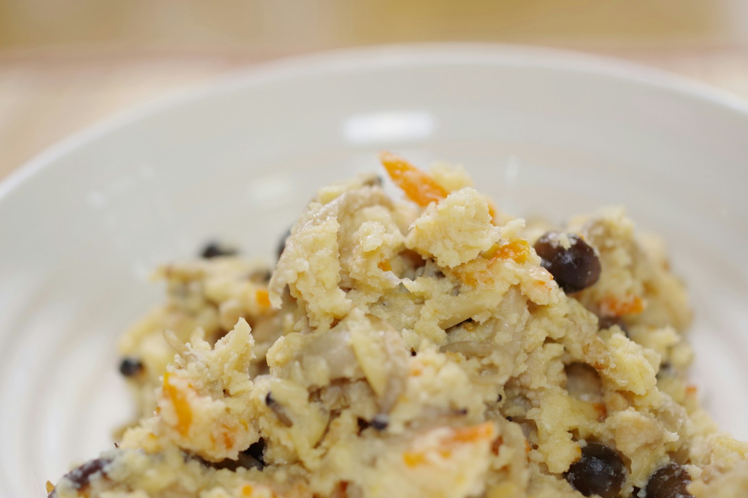 Creamy oatmeal dish served in a white bowl