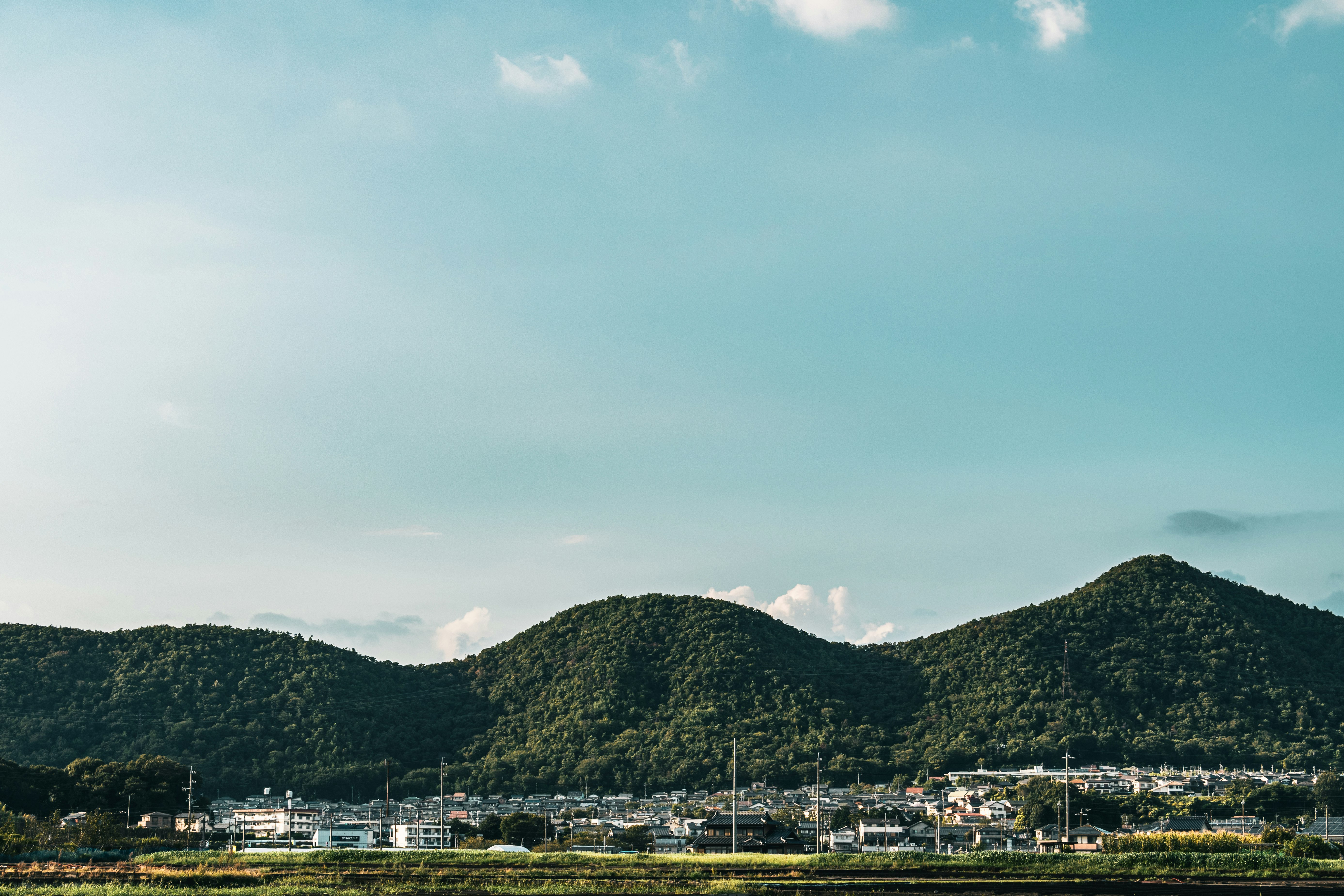 mountain range and seaside harbor landscape