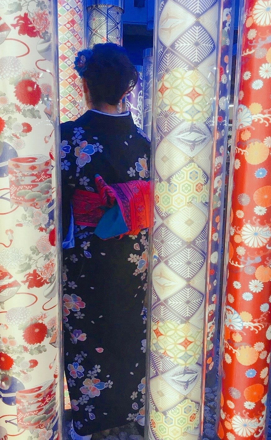 Japanese-pattern kimono hanging in a shop noren