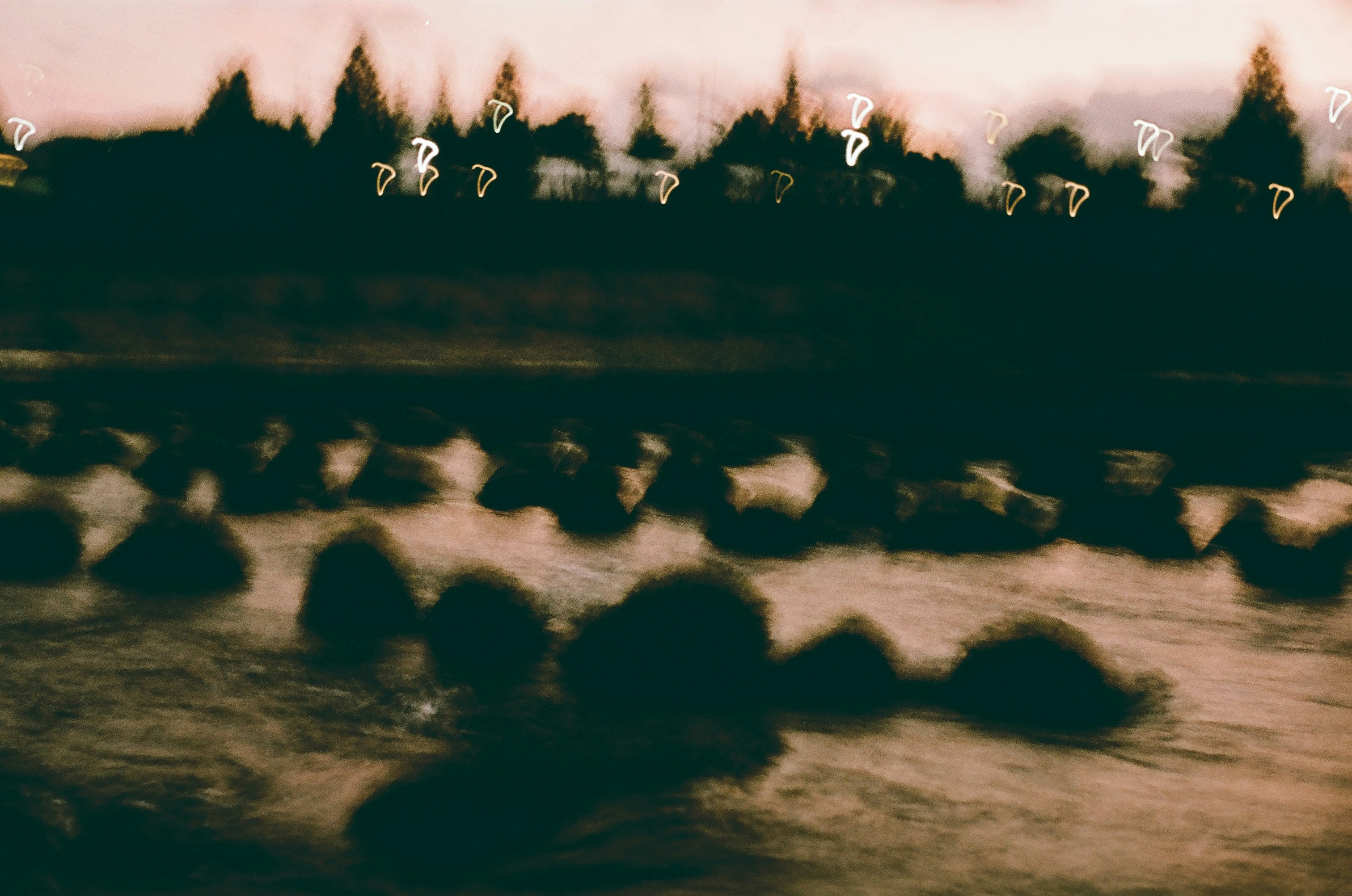 riverbank landscape with vibrating rocks