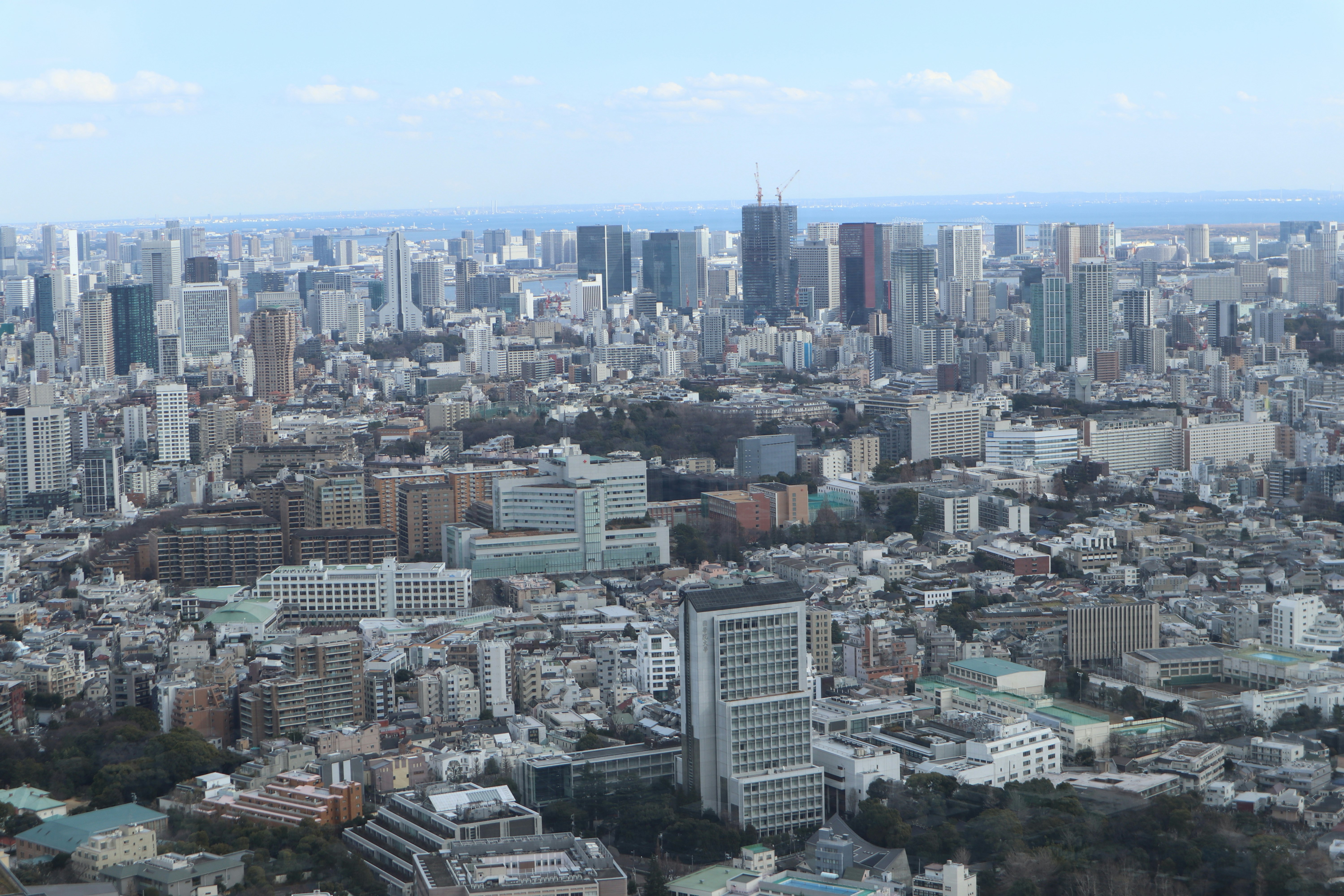 aerial view of a dense city skyline with high-rise buildings