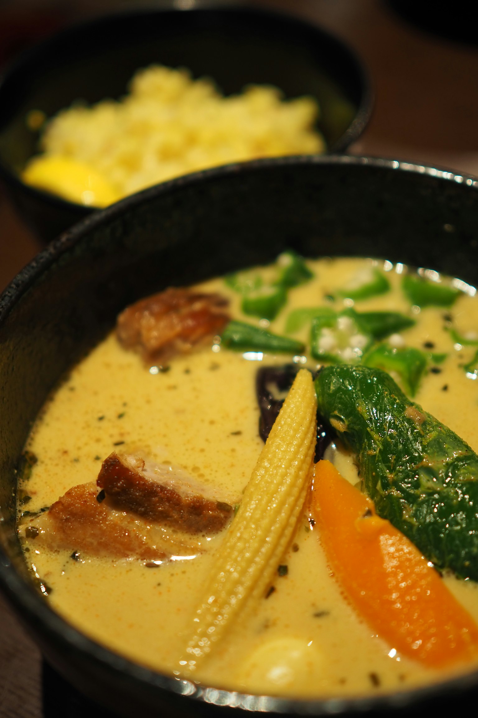 Creamy soup with vegetables and meat ingredients