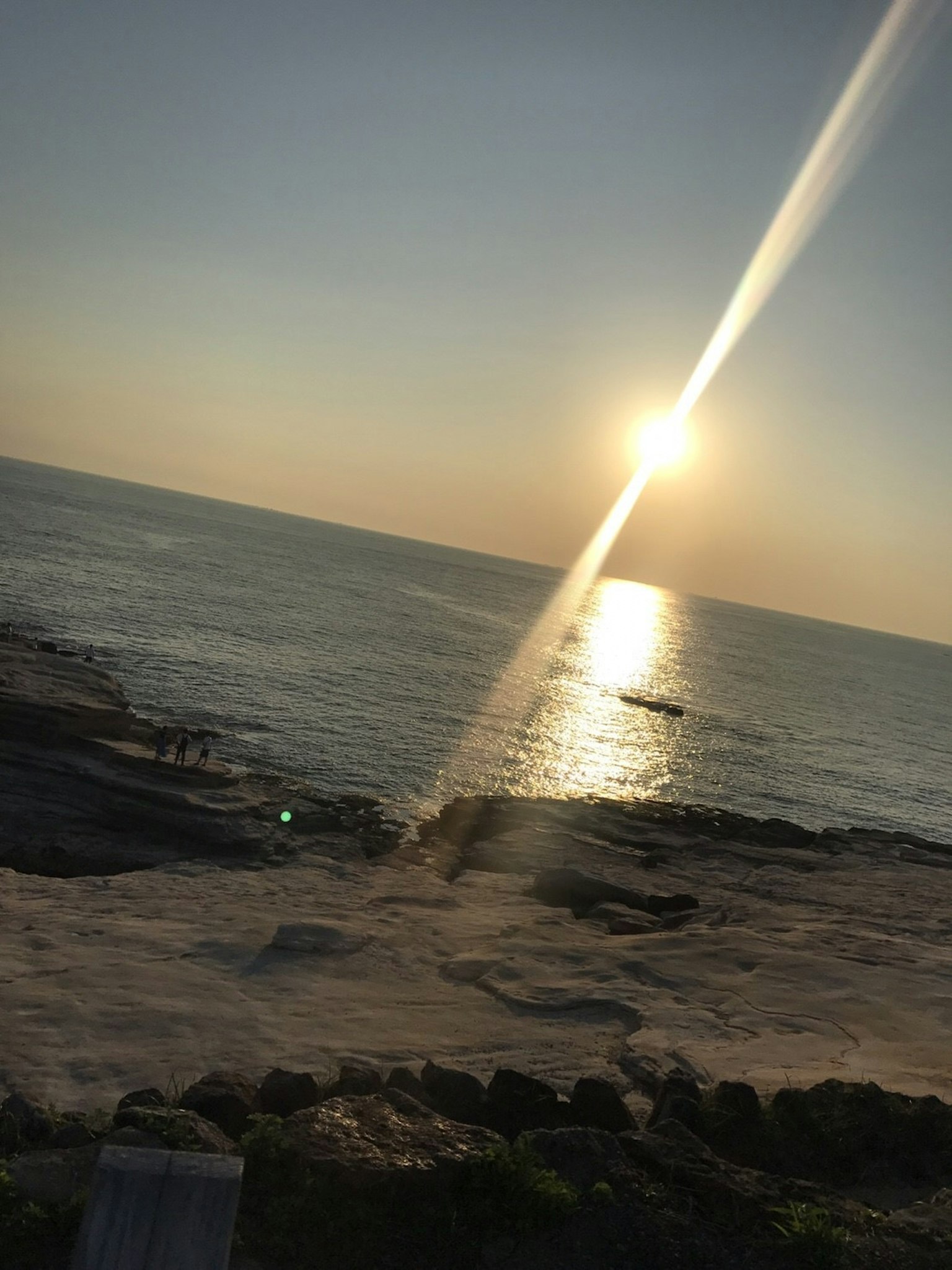 Beautiful sunset over the ocean with shimmering water