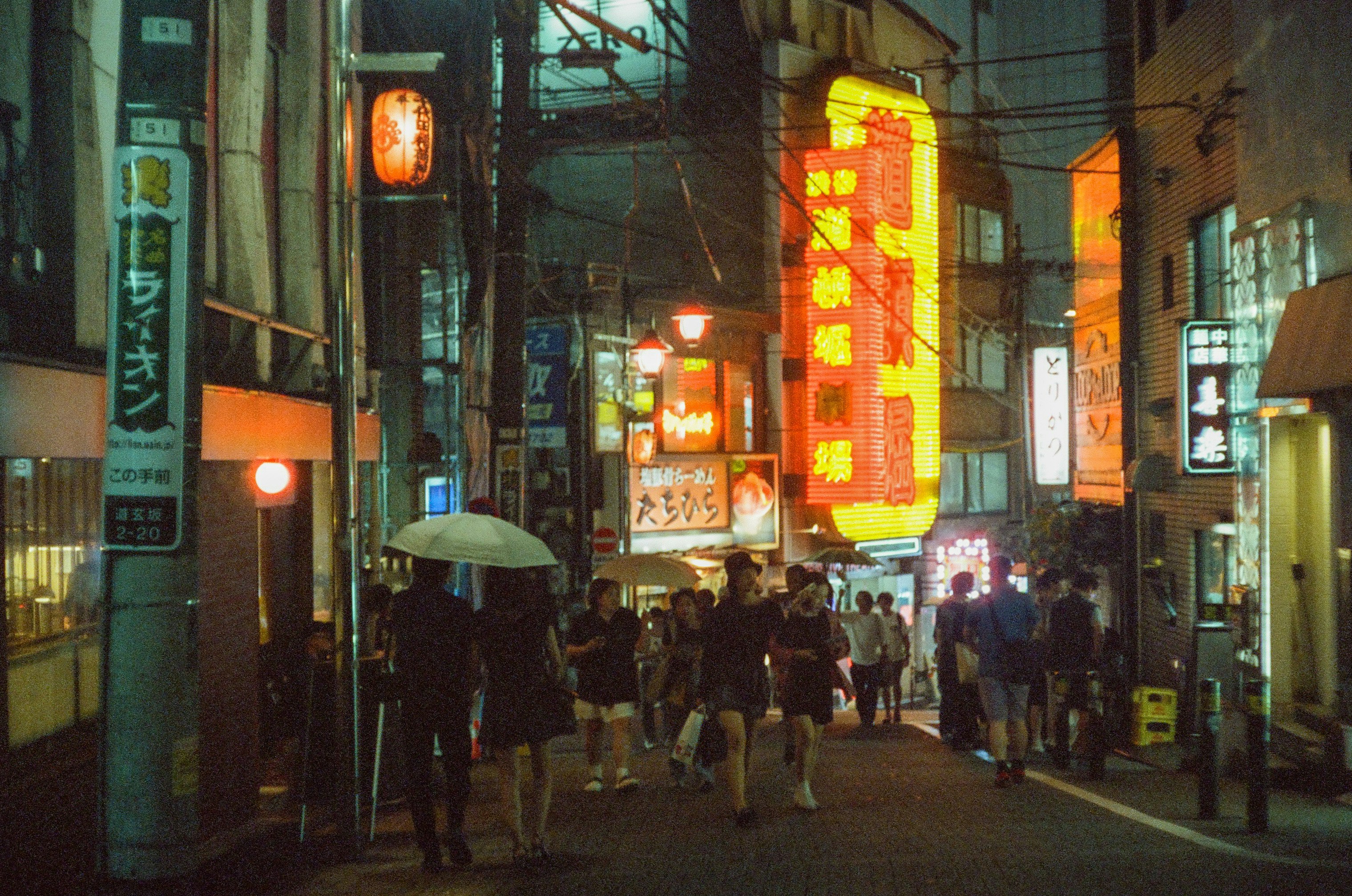 Shibuya Dotonbori lively night shopping street scene
