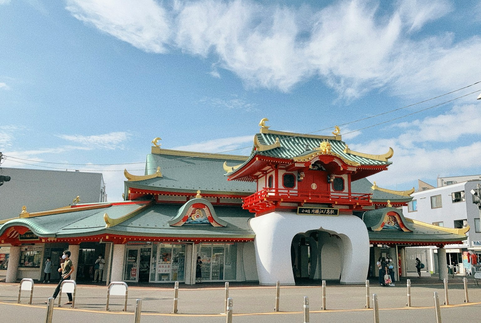 Traditional Japanese architecture building Bright blue sky with white clouds Beautifully decorated roof