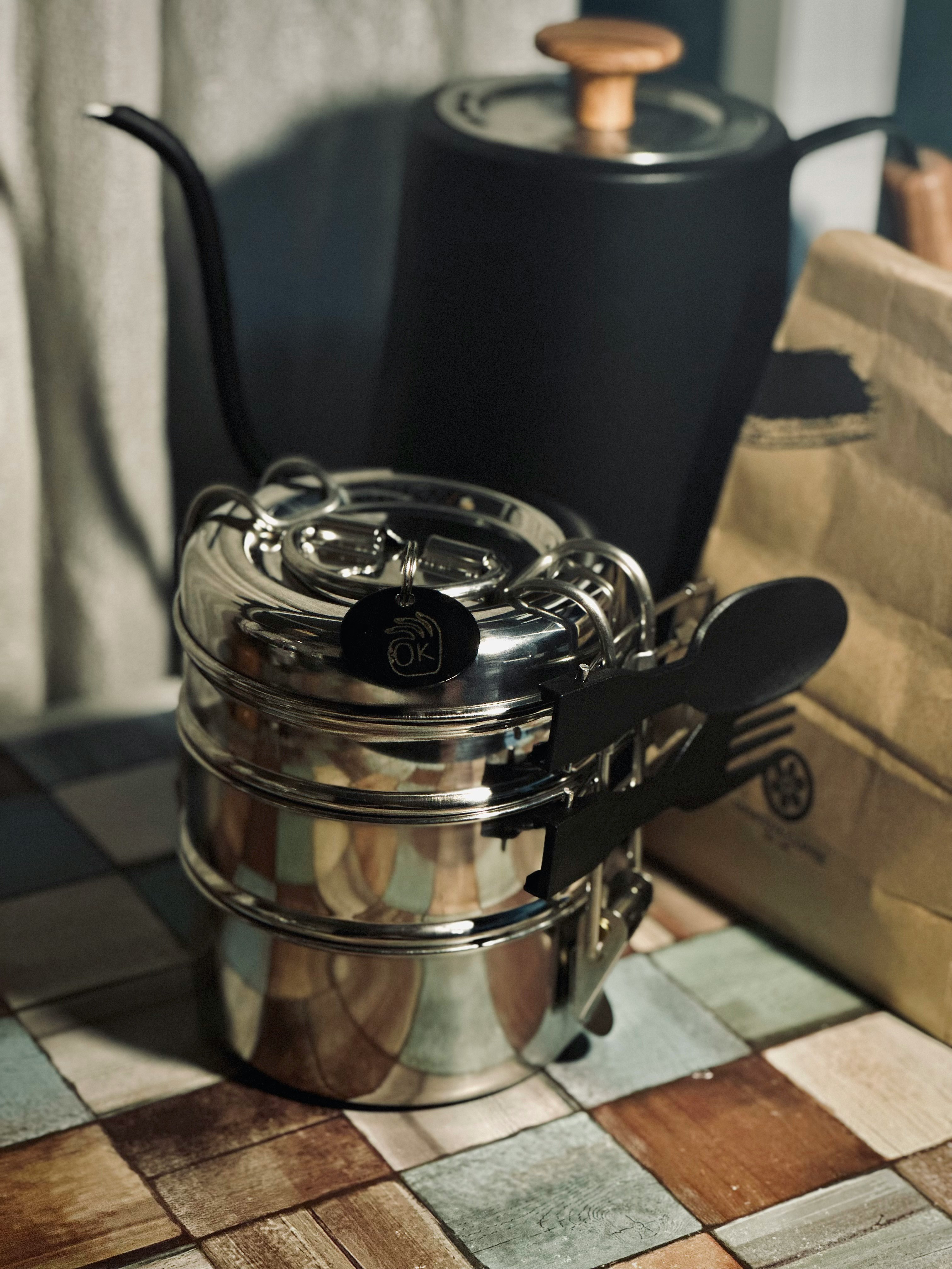 bento box and kitchen tools on a spice curry shop counter