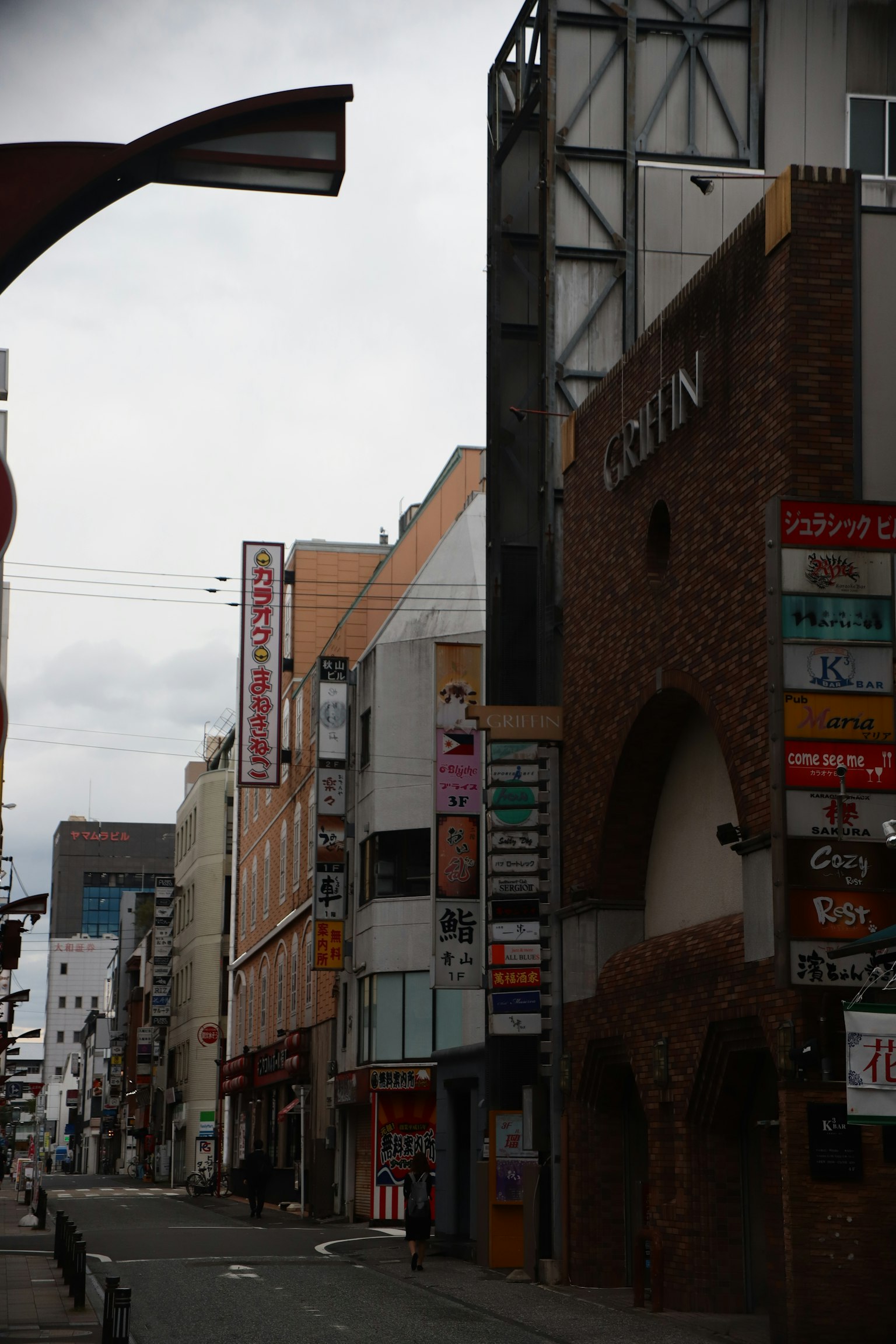 Urban scene featuring commercial buildings and signage