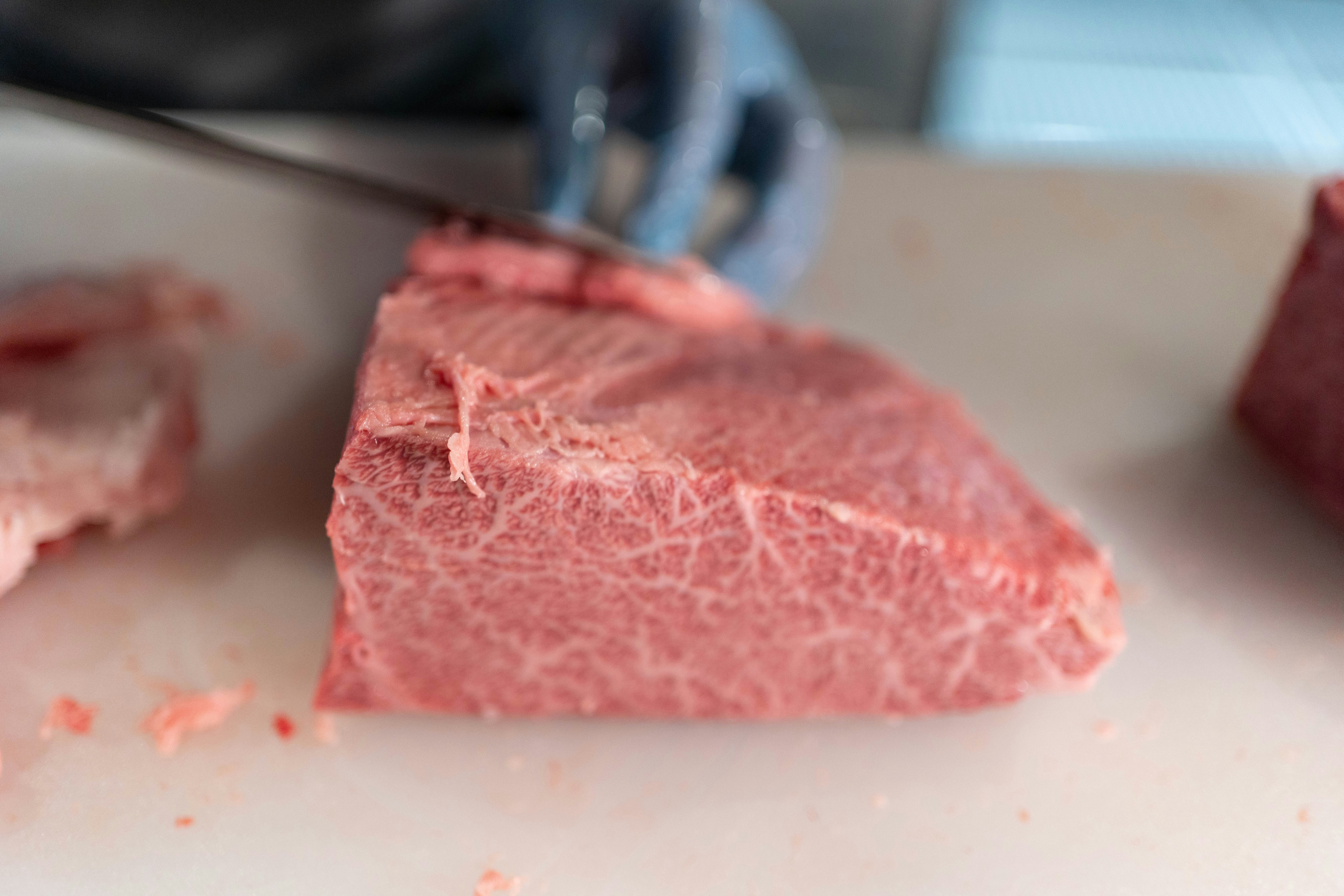 image of a chunk of red meat on a cutting board