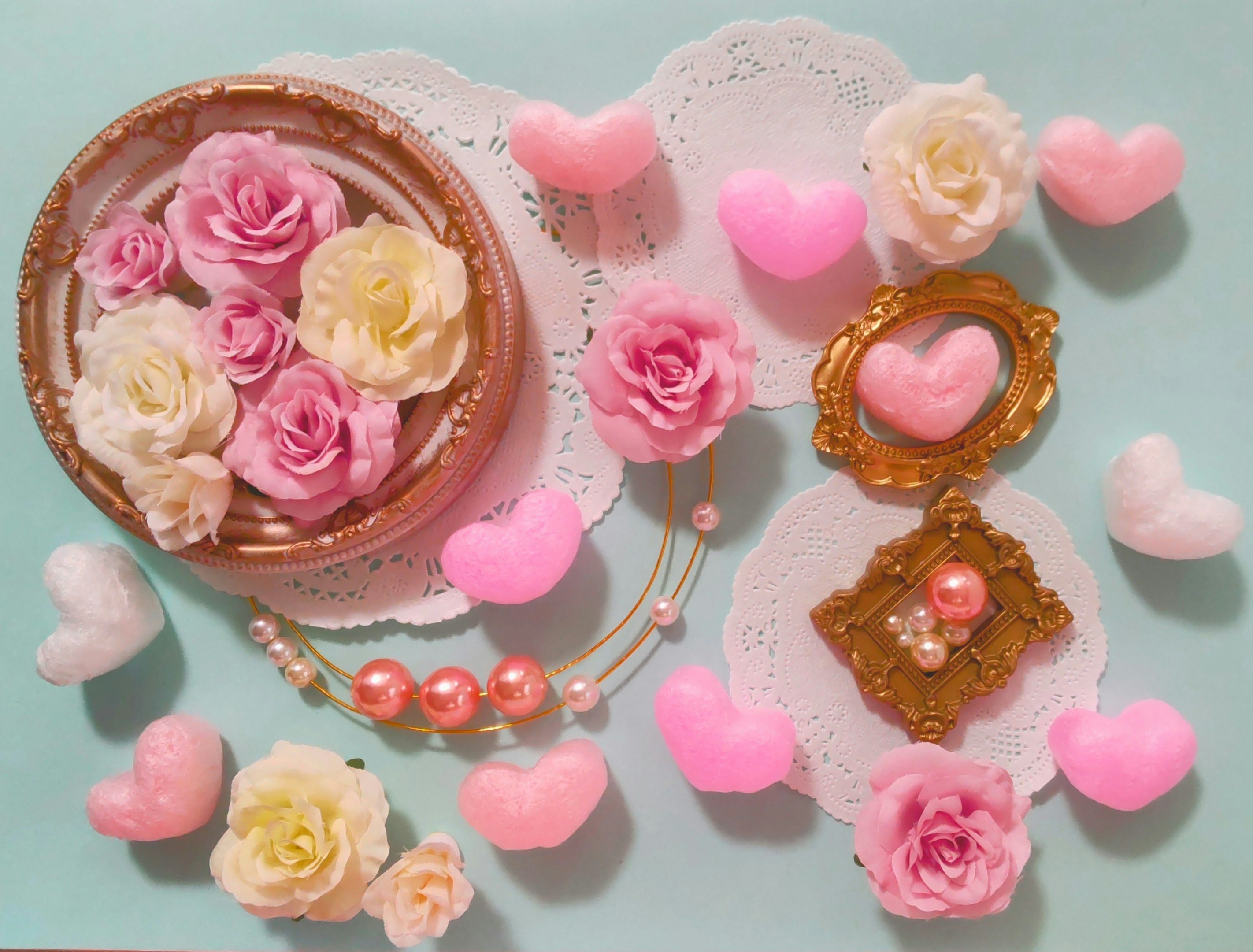 Valentine-style framed decor with pink flowers and heart ornaments image