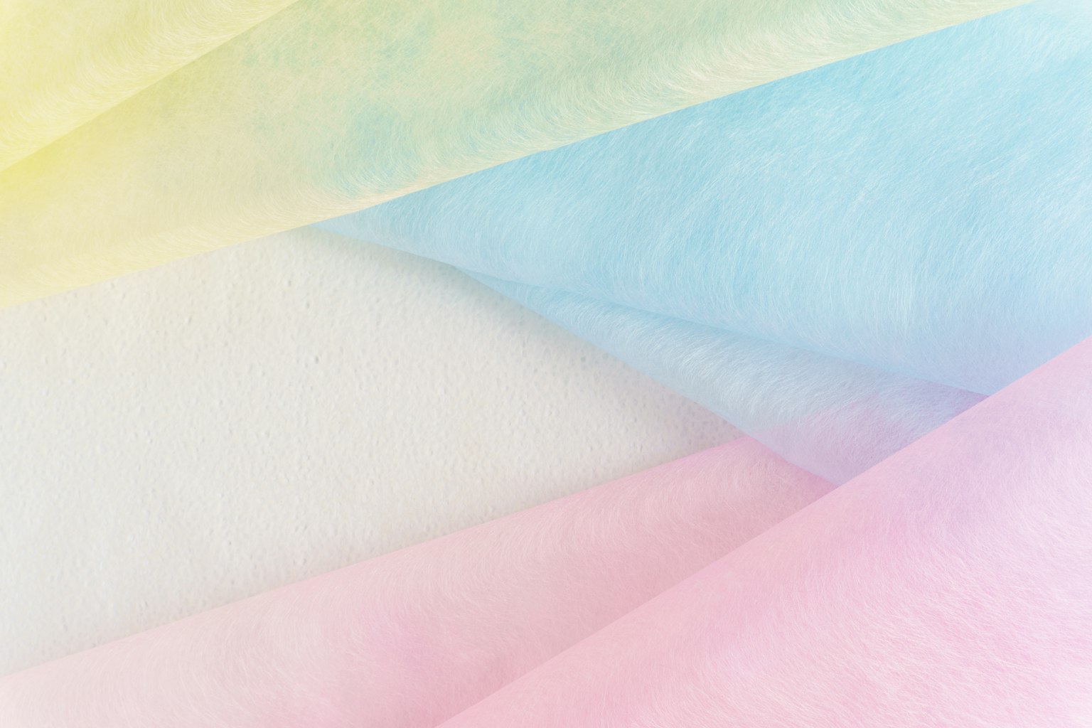 Soft pastel colored fabrics layered together