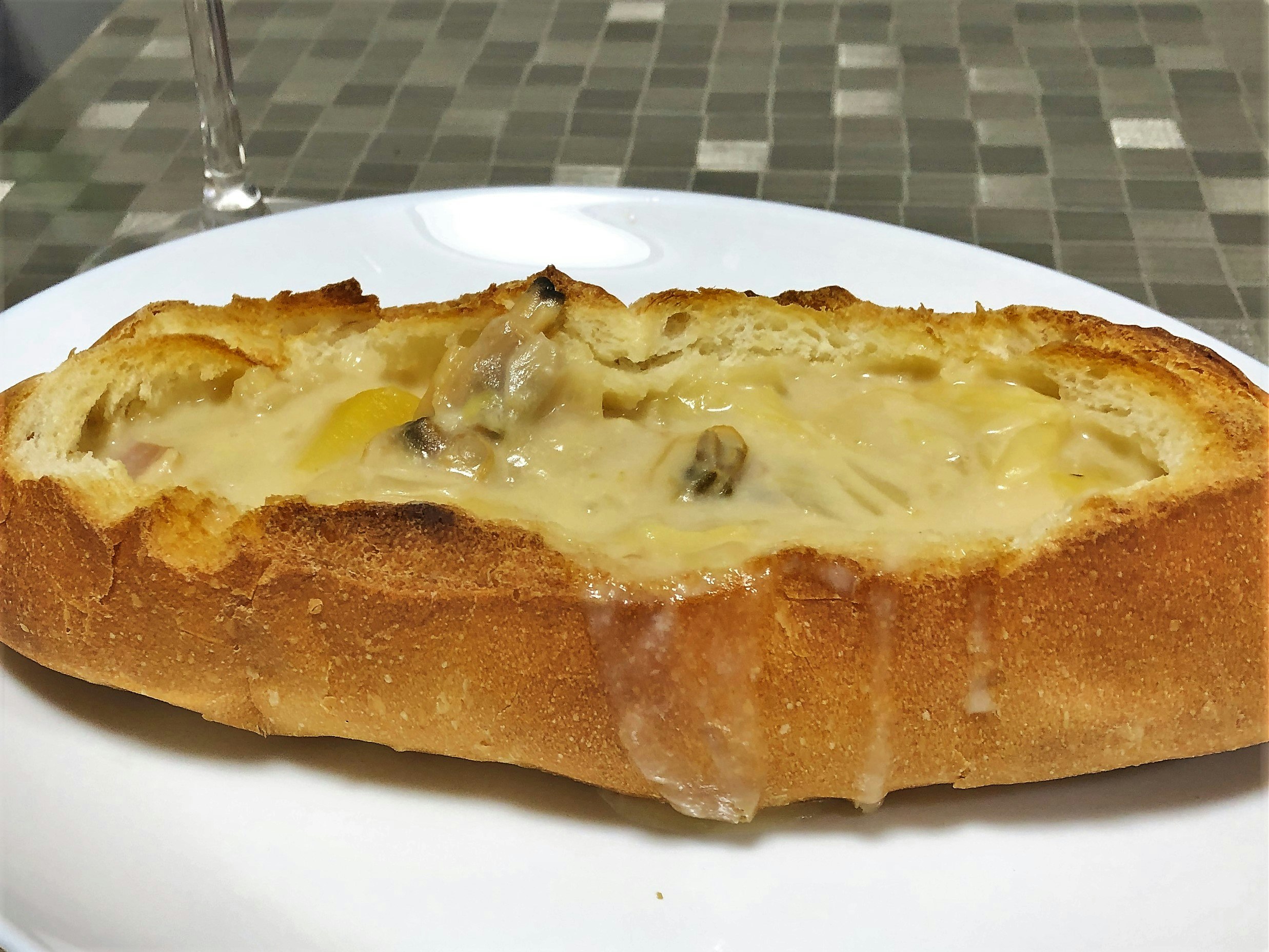 baked cheesy bread with toppings
