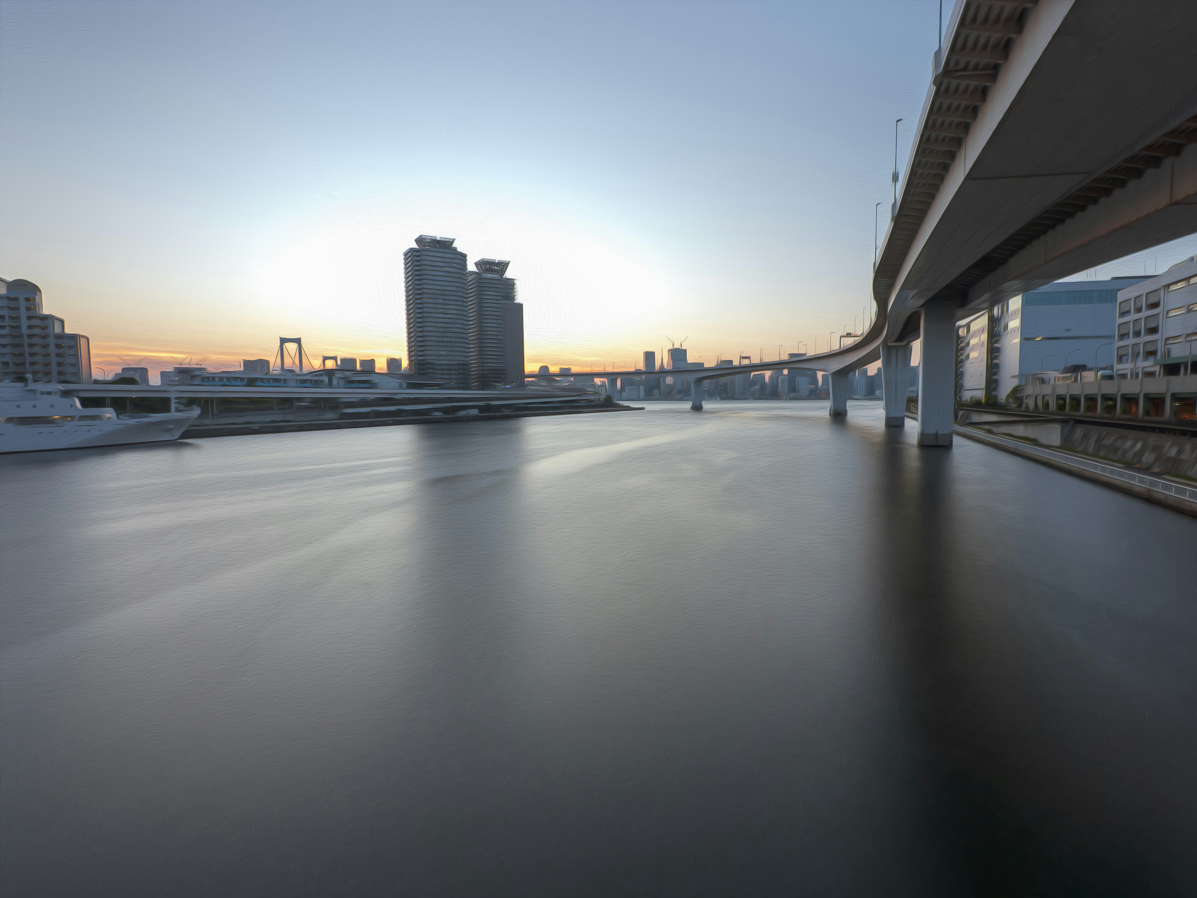 jalan setapak tepi sungai dengan gedung-gedung tinggi saat senja