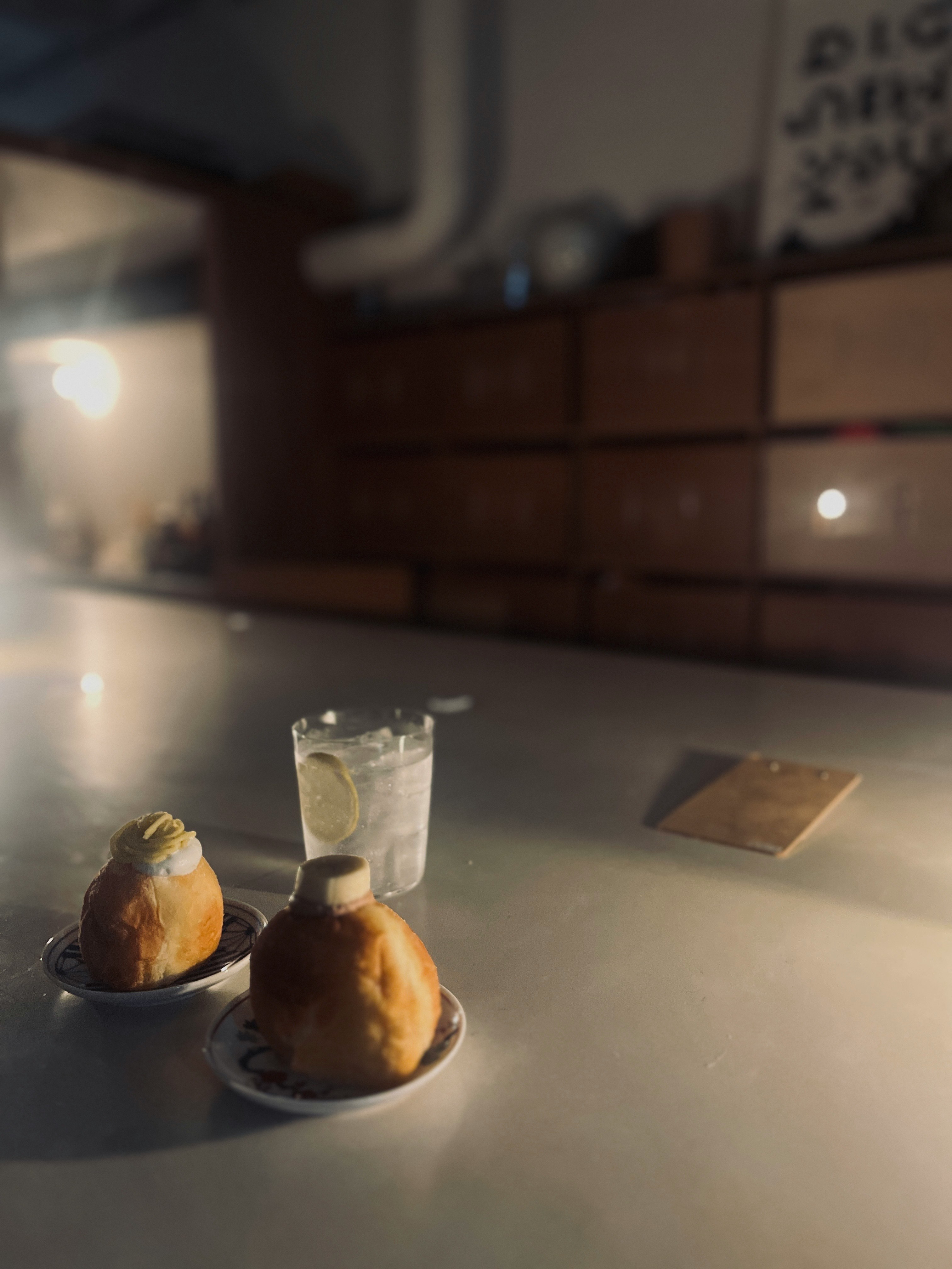 donuts and drinks on a café counter table