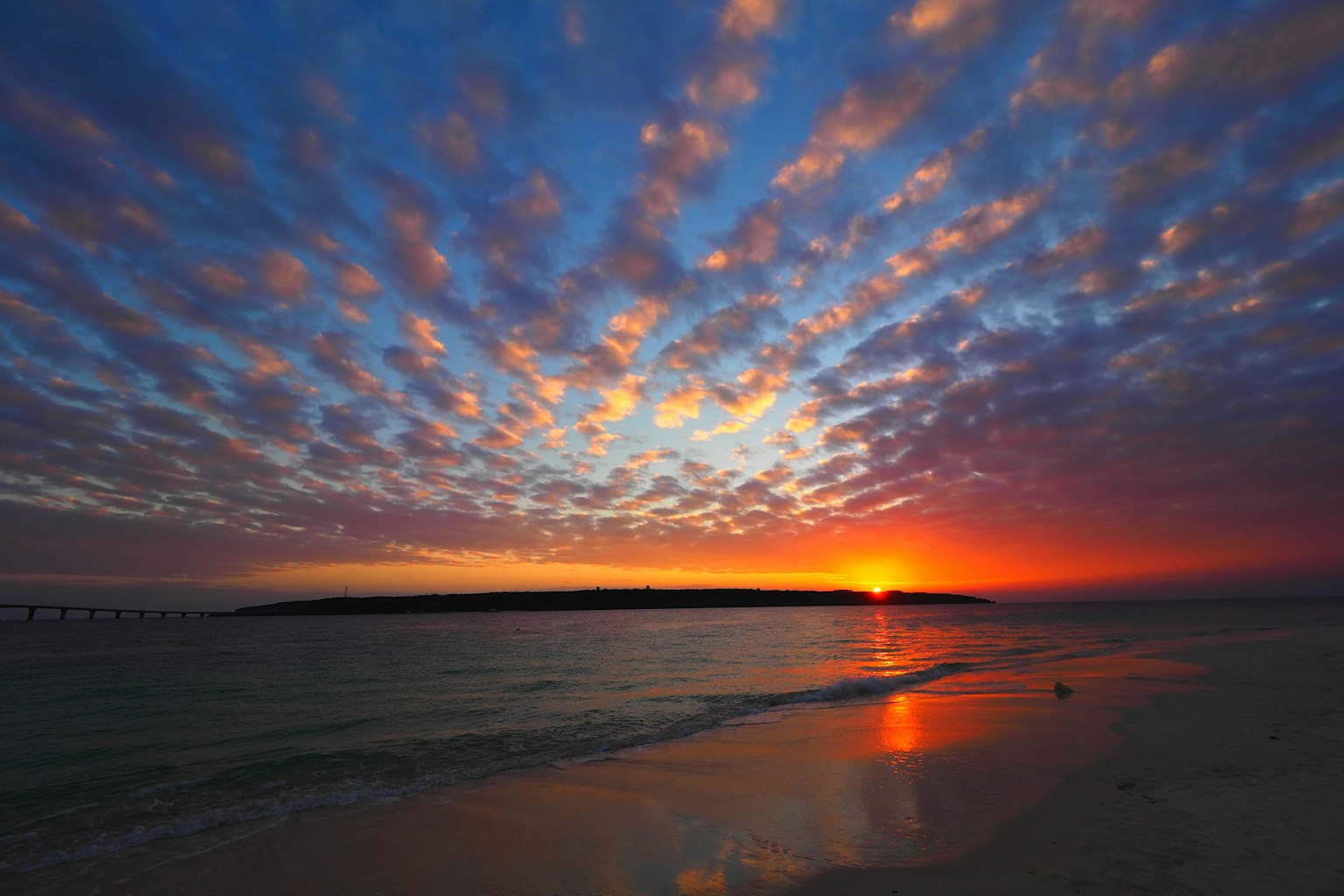Beautiful sunset with colorful clouds over the ocean