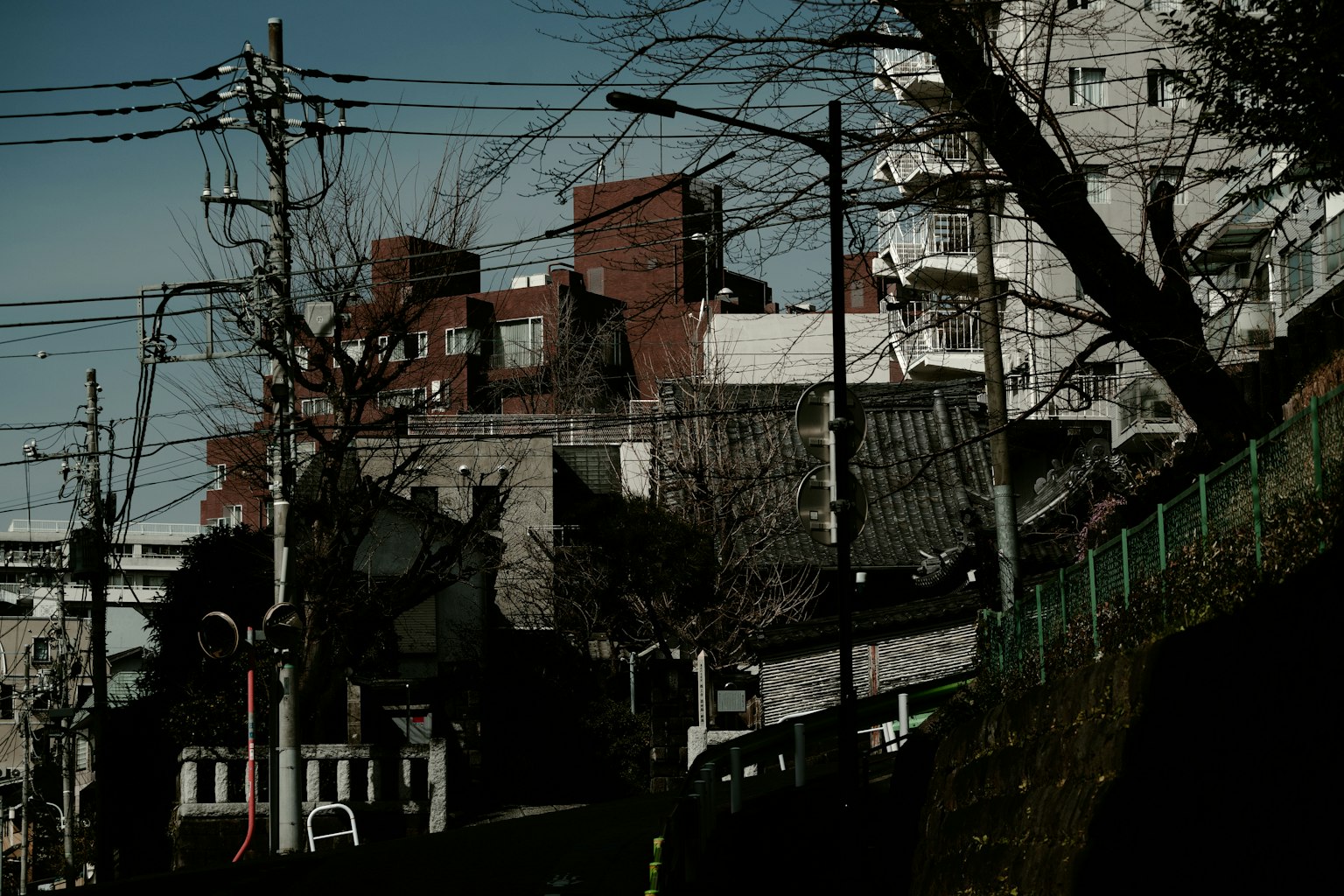 Urban landscape featuring buildings and power lines