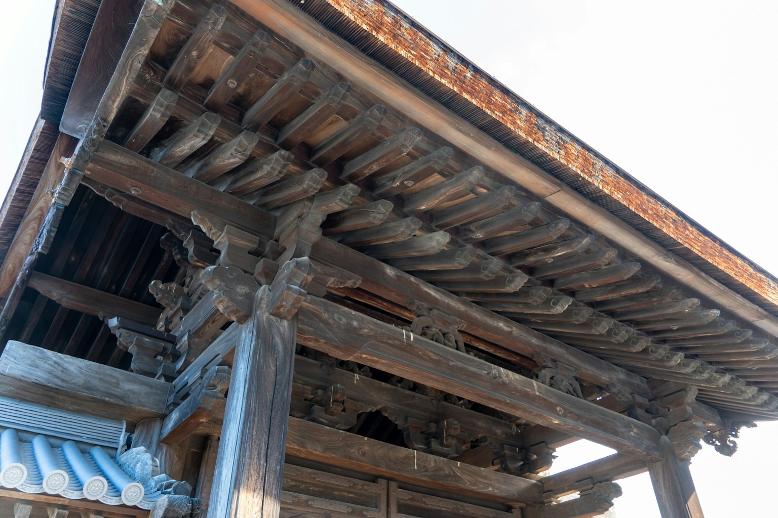 Traditional Japanese architectural roof structure with wooden details