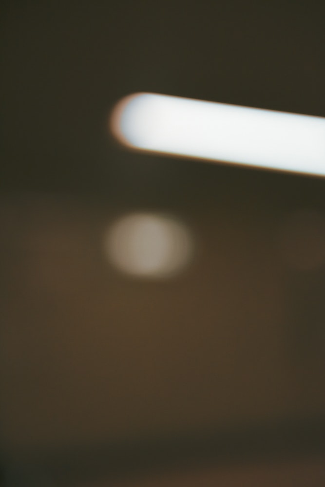 blurred streaks of light on a dark background