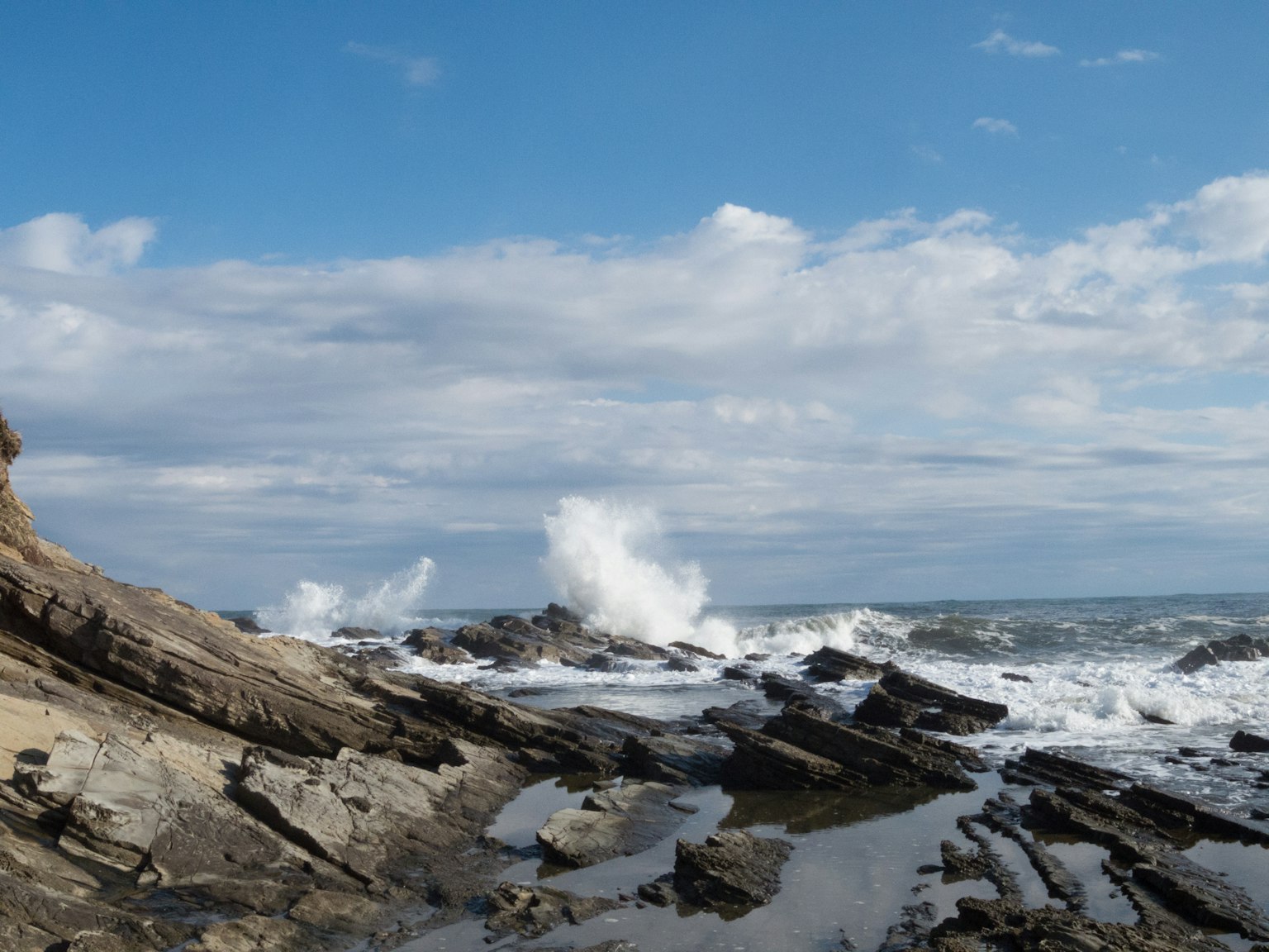 Rocky coastline with crashing waves