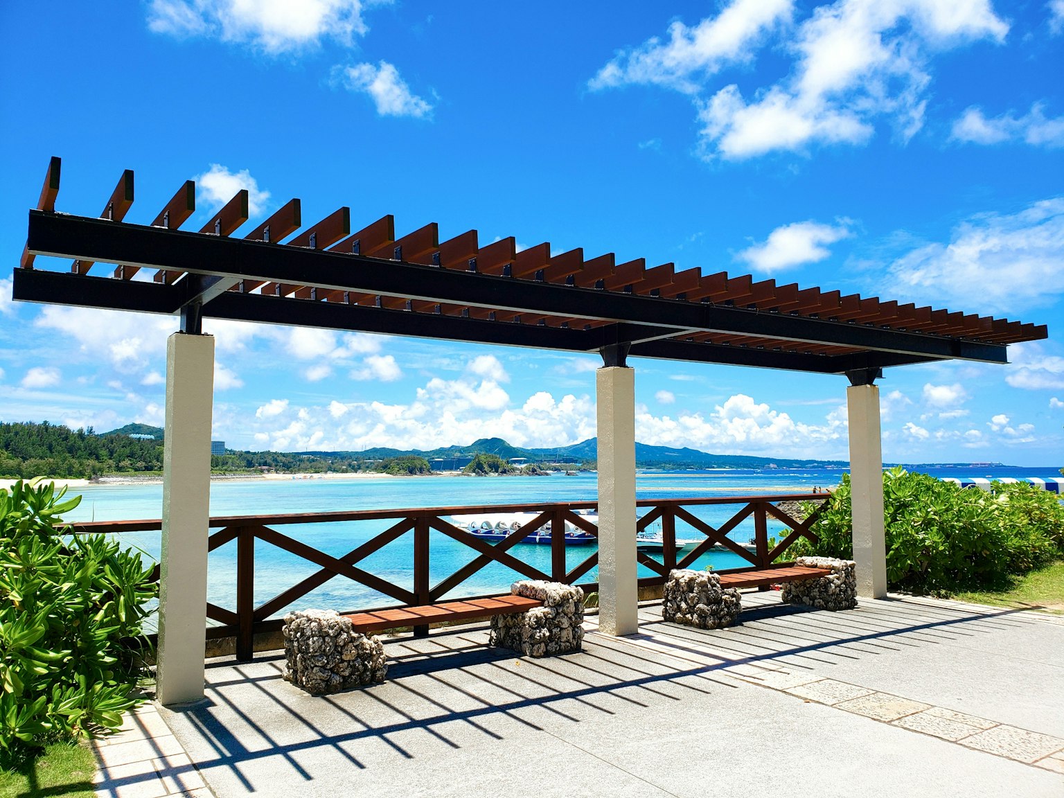 Pergola with benches overlooking a beautiful ocean view