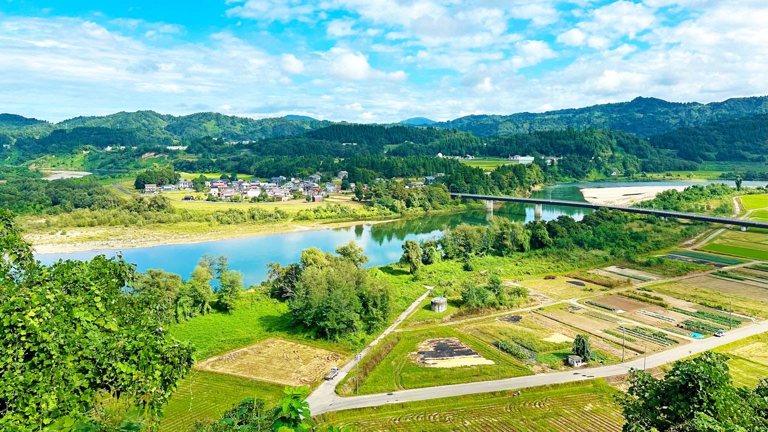 Scenic view of a river and lush countryside