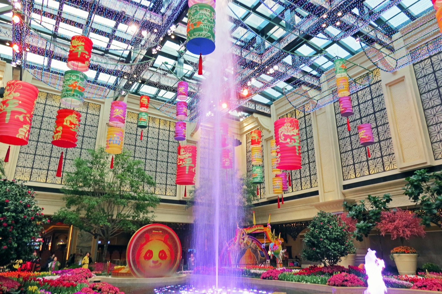 Indoor fountain with colorful lanterns and vibrant decorations