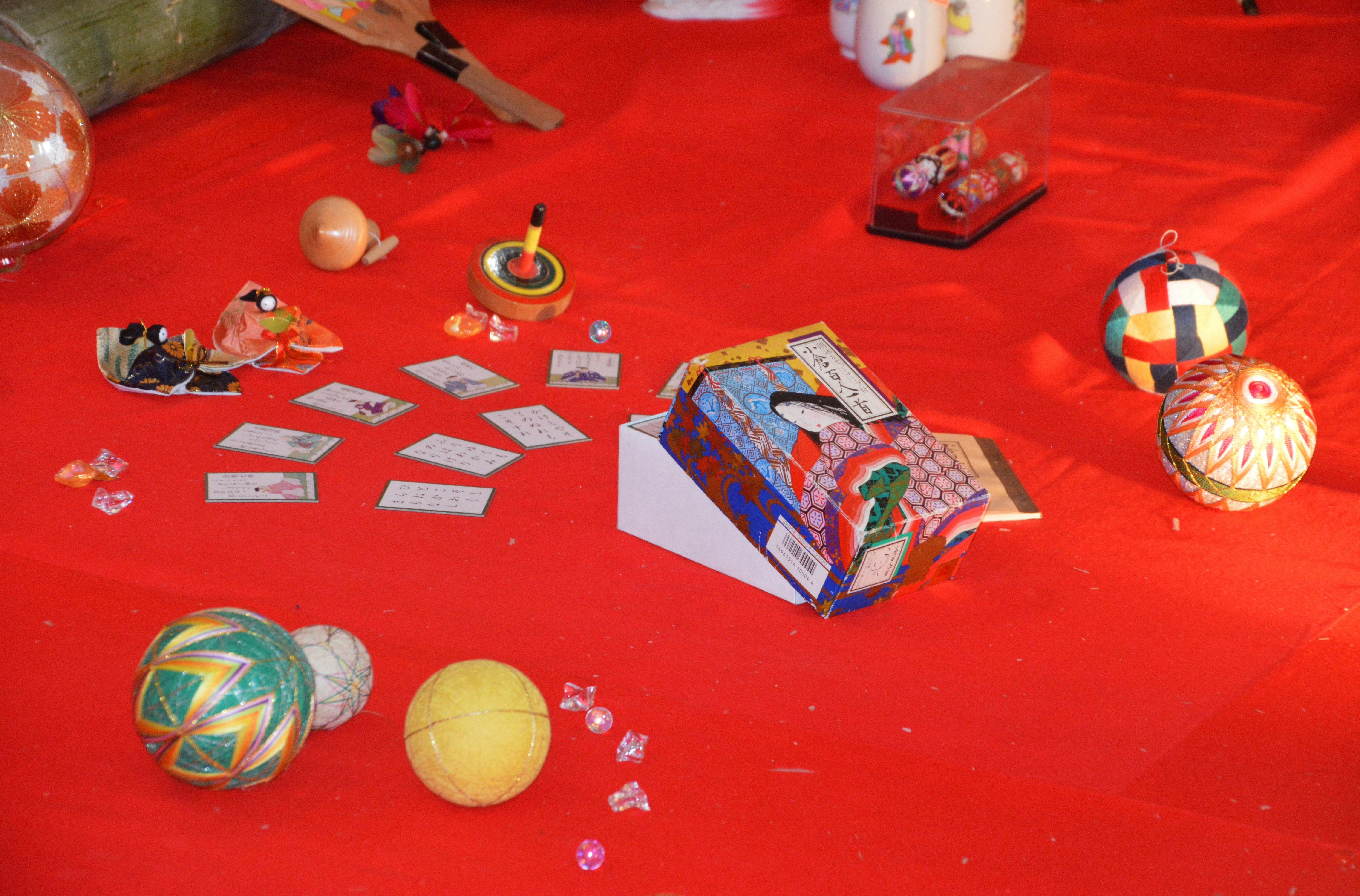 Yanagawa Hinamatsuri sagemon decorations on a red cloth