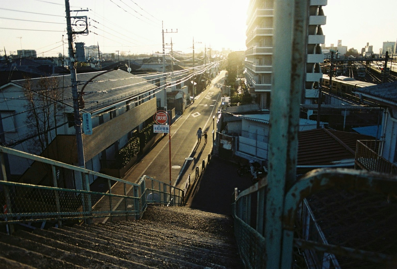 View of a cityscape at dusk from a staircase