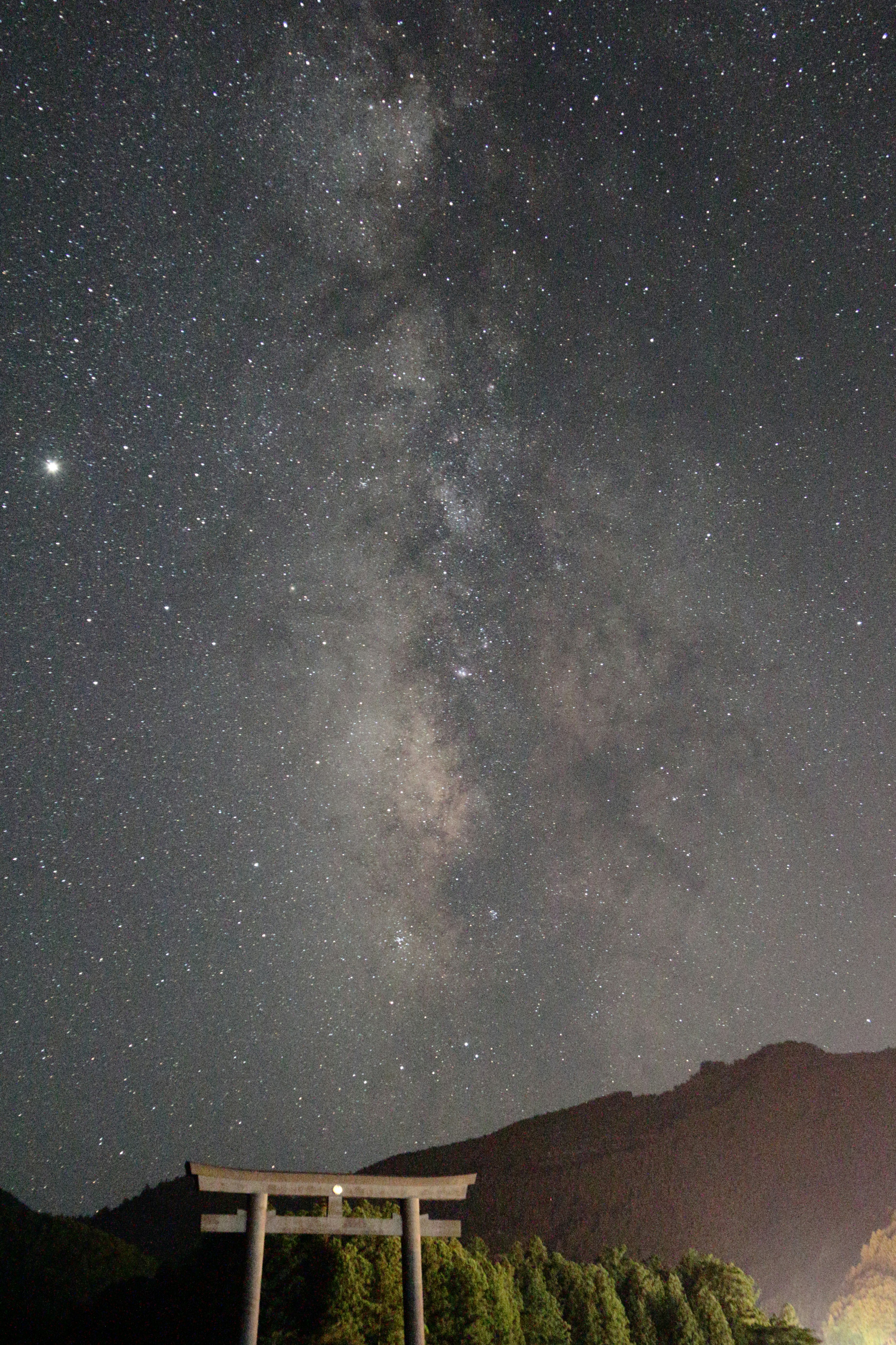 Torii under the Milky Way and starry sky