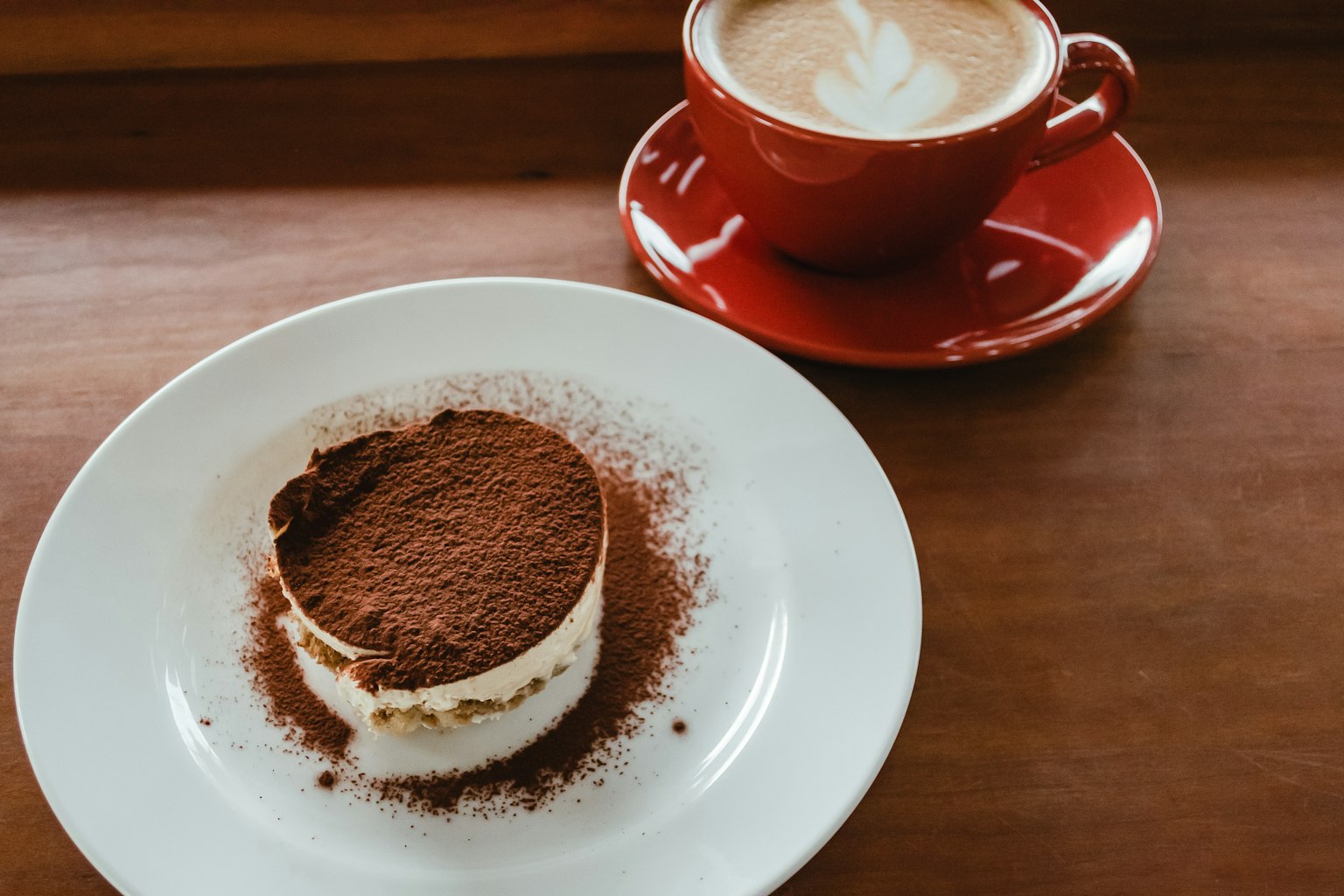 Beautiful presentation of tiramisu and cappuccino
